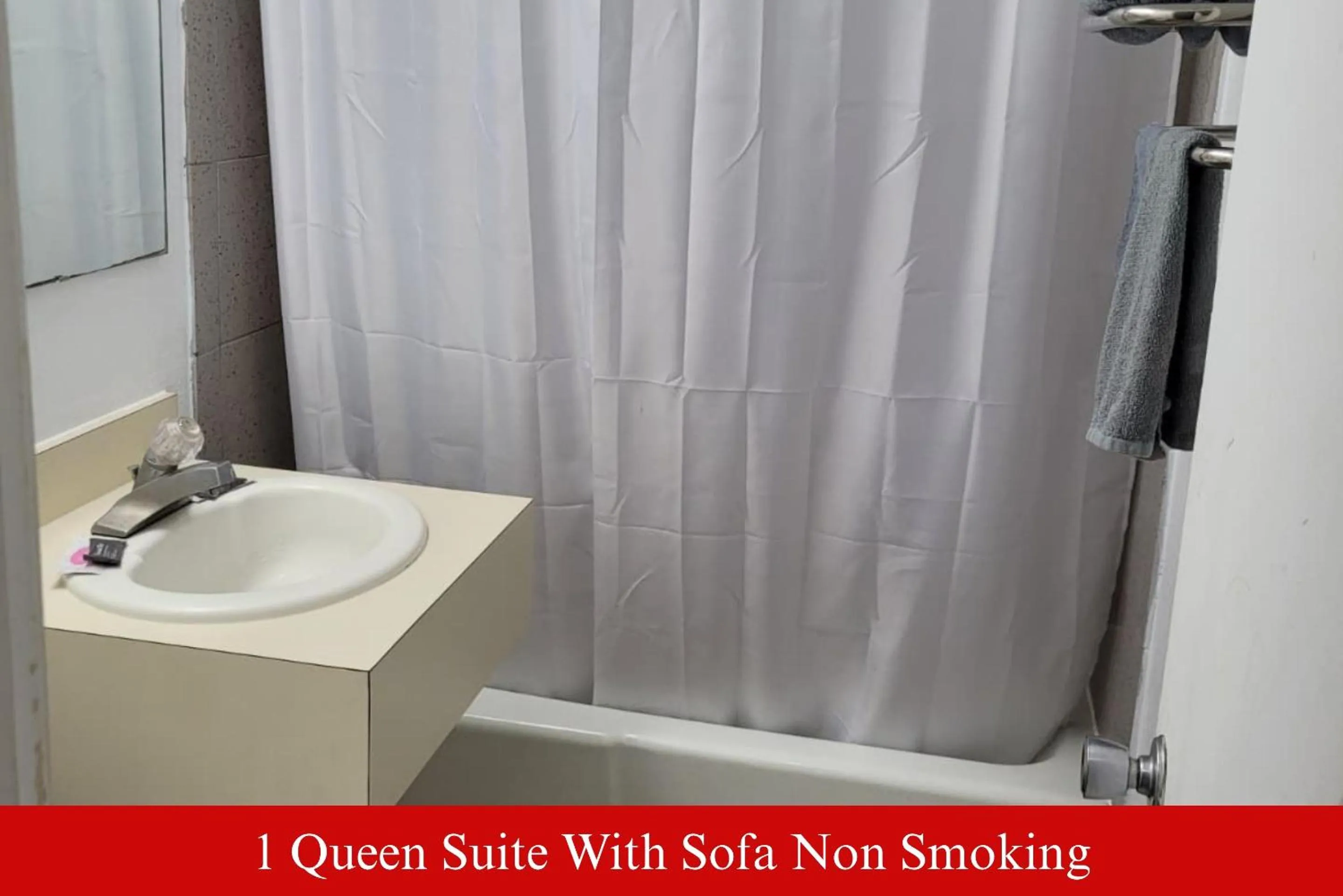 Bathroom in Coratel Inn & Suites by Jasper Hutchinson