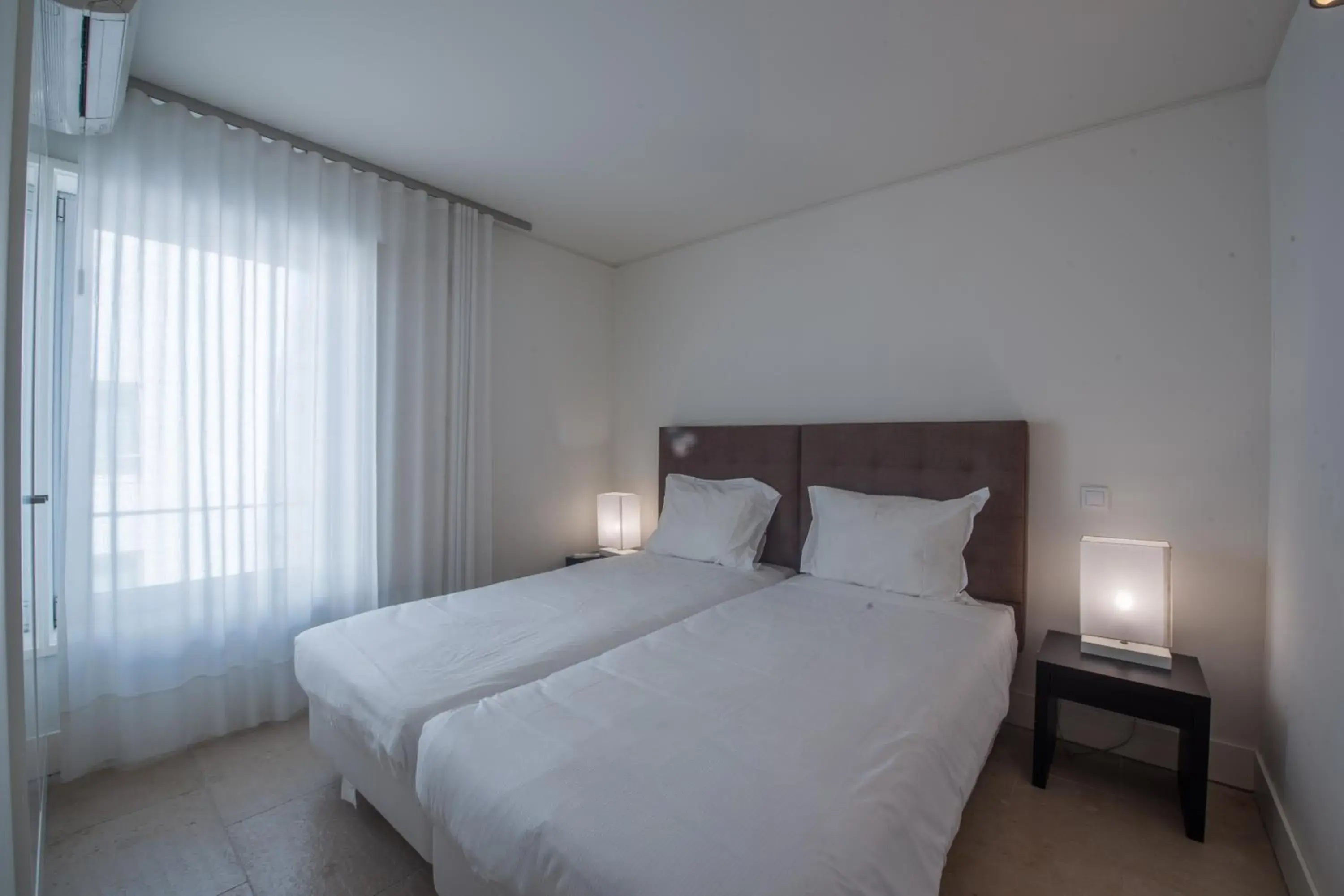 Bed in Troia Residence by The Editory - Apartamentos Marina Bed in Troia Residence by The Editory - Apartamentos Marina