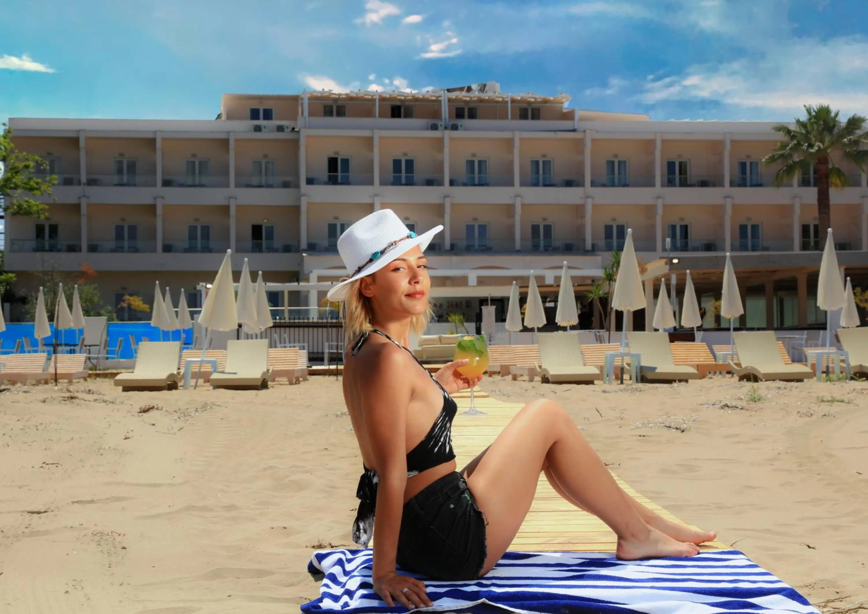 People in Cavomarina Beach- Adults Only