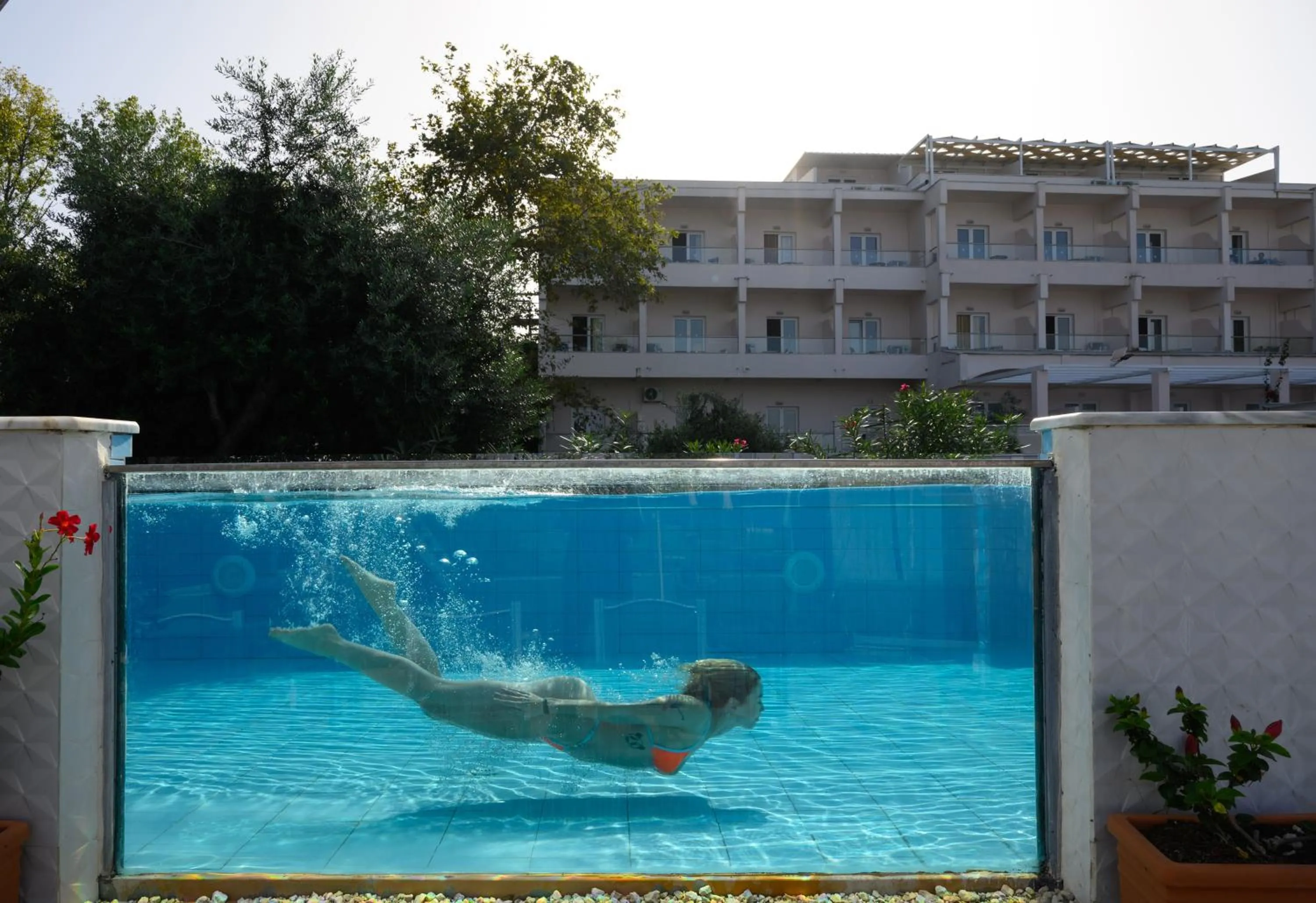 People in Cavomarina Beach- Adults Only