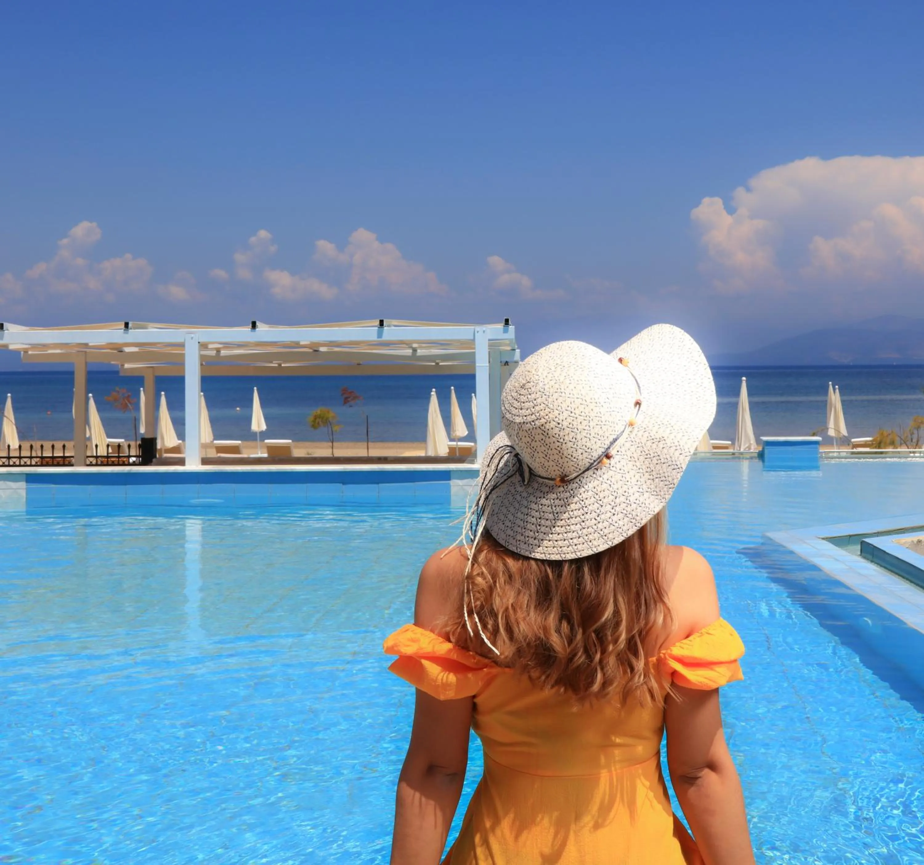 People in Cavomarina Beach- Adults Only