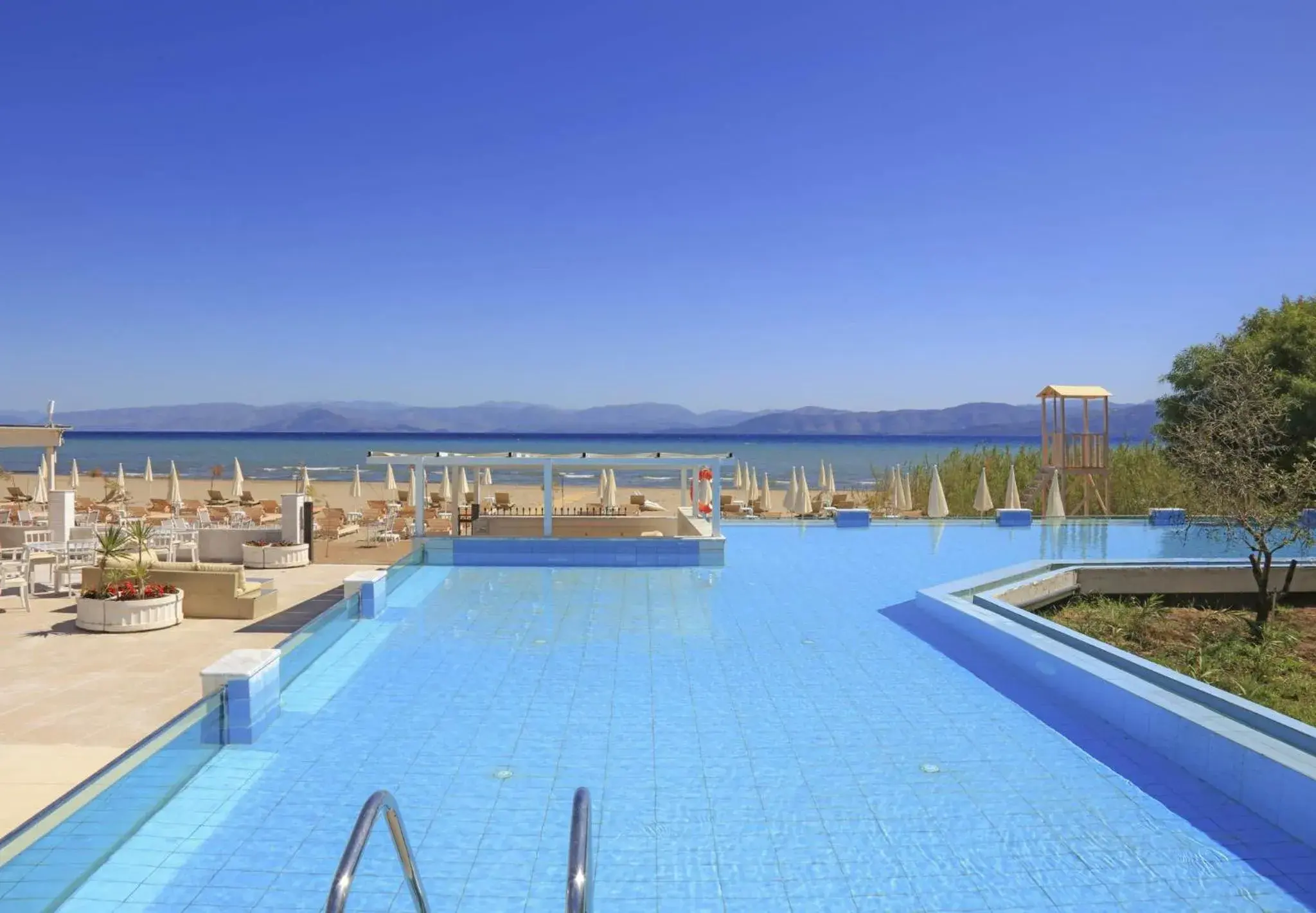 Pool view in Cavomarina Beach- Adults Only Pool view in Cavomarina Beach- Adults Only