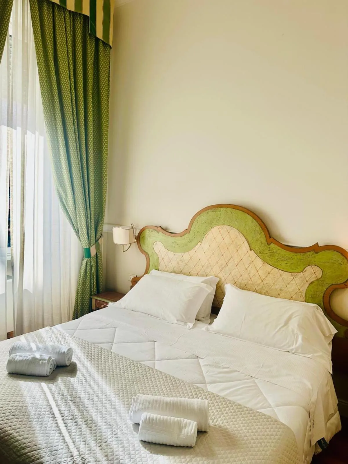 Bed in Il Gattopardo Relais