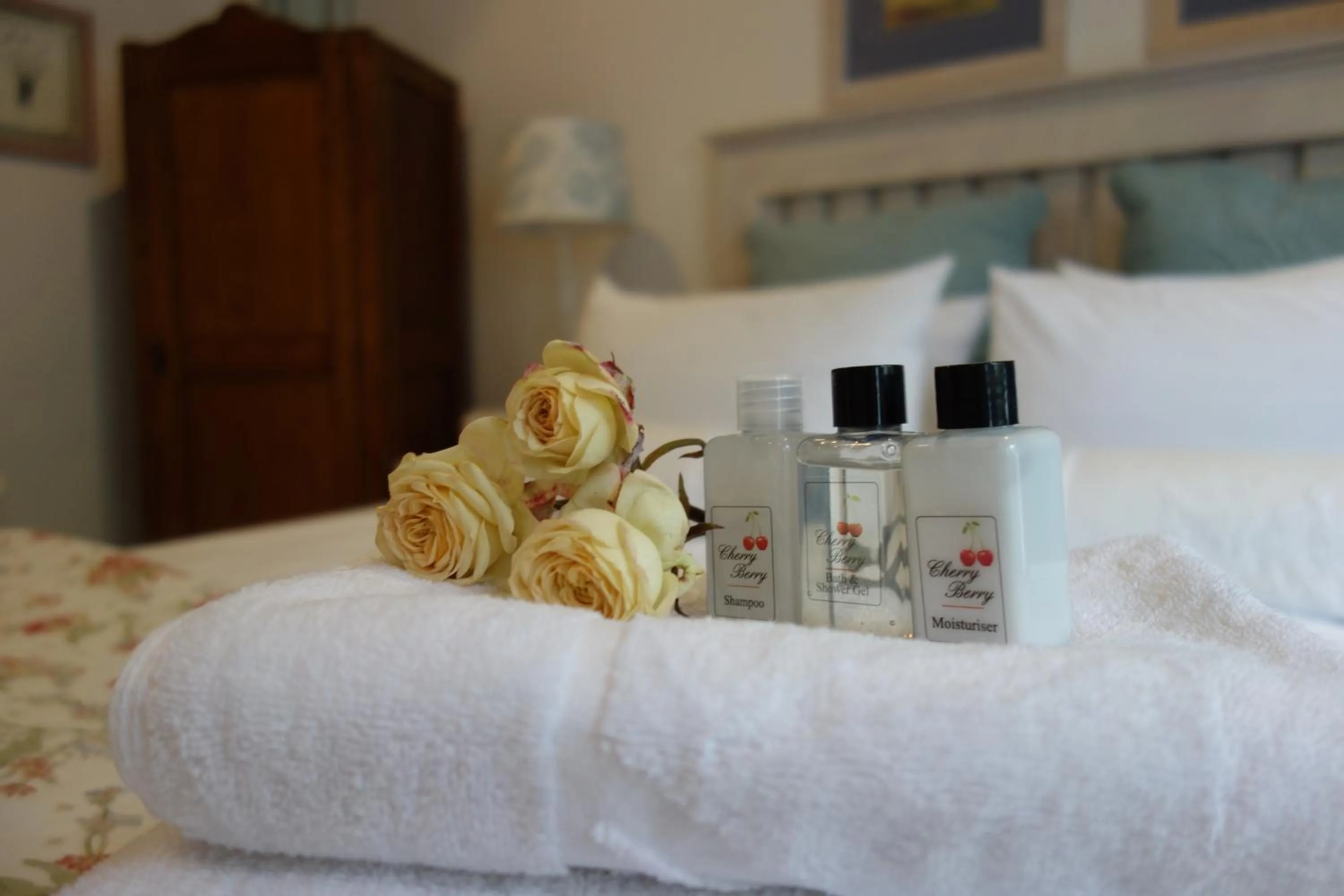 Decorative detail, Bed in Cherry Berry Guest House