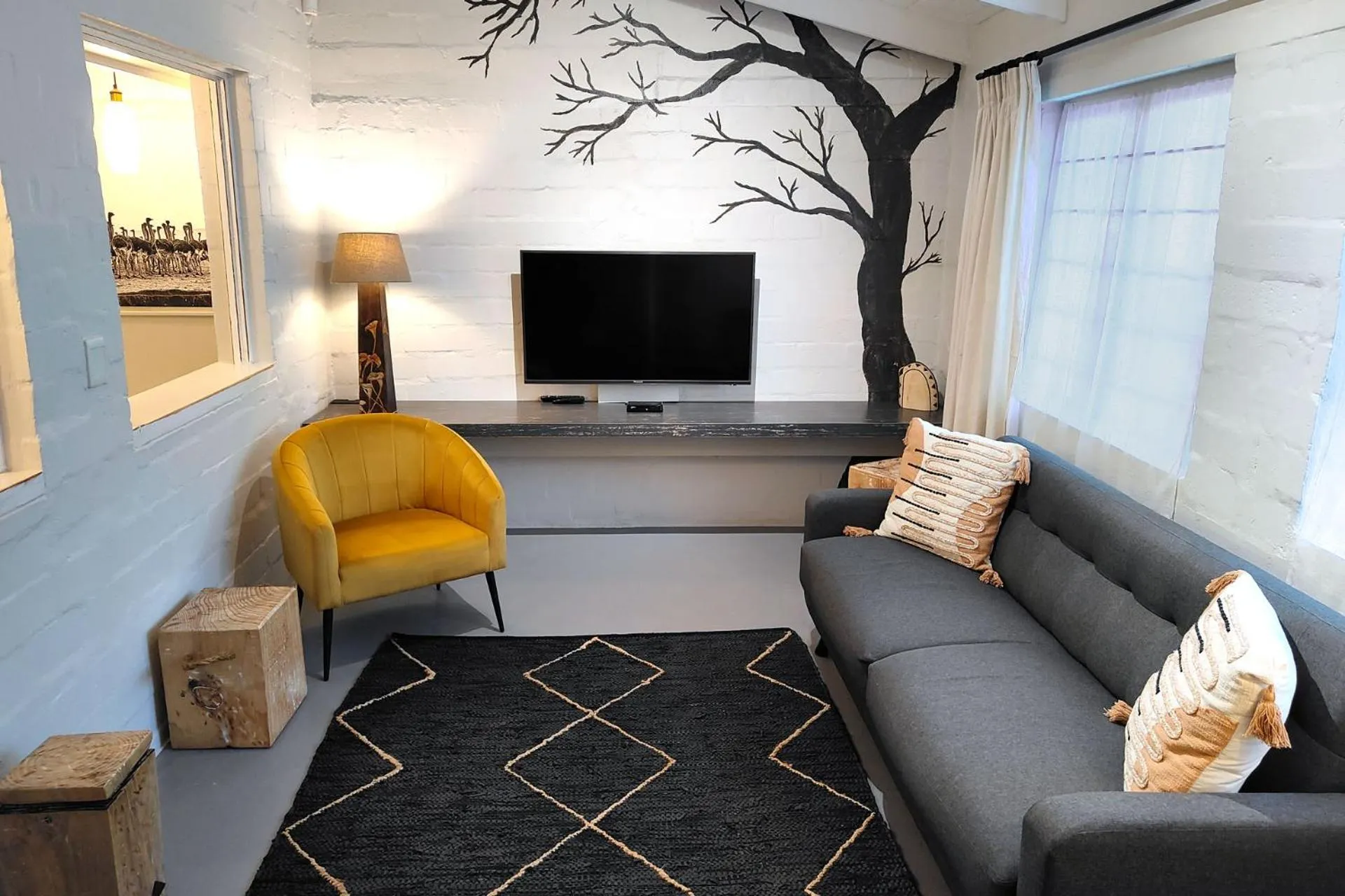 Lounge or bar in Hornbill House Self Catering Accommodation