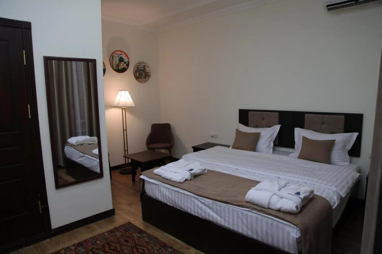 Bed in Crystal Hotel Bukhara