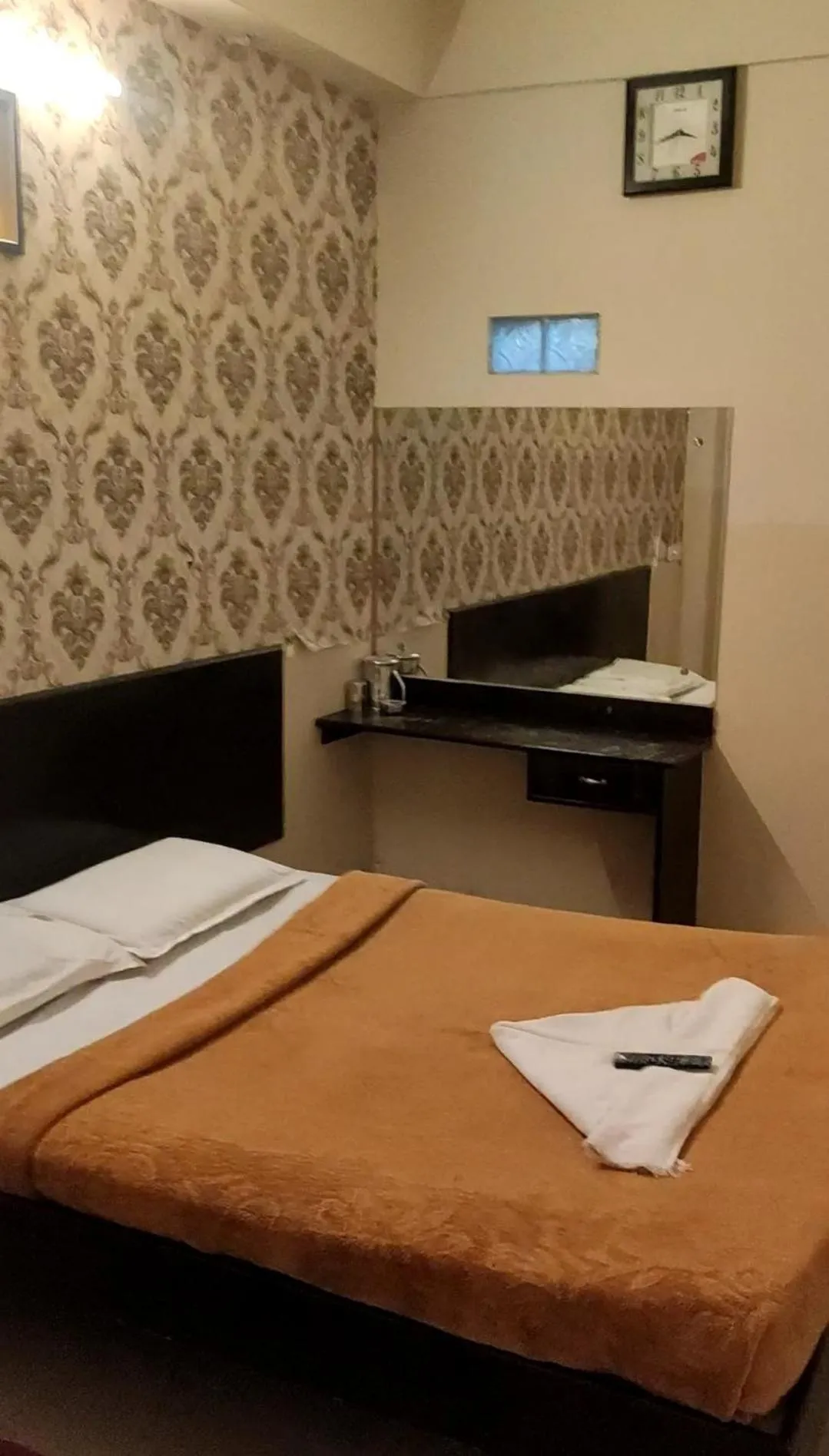 Bed in Raj Residency Mysuru
