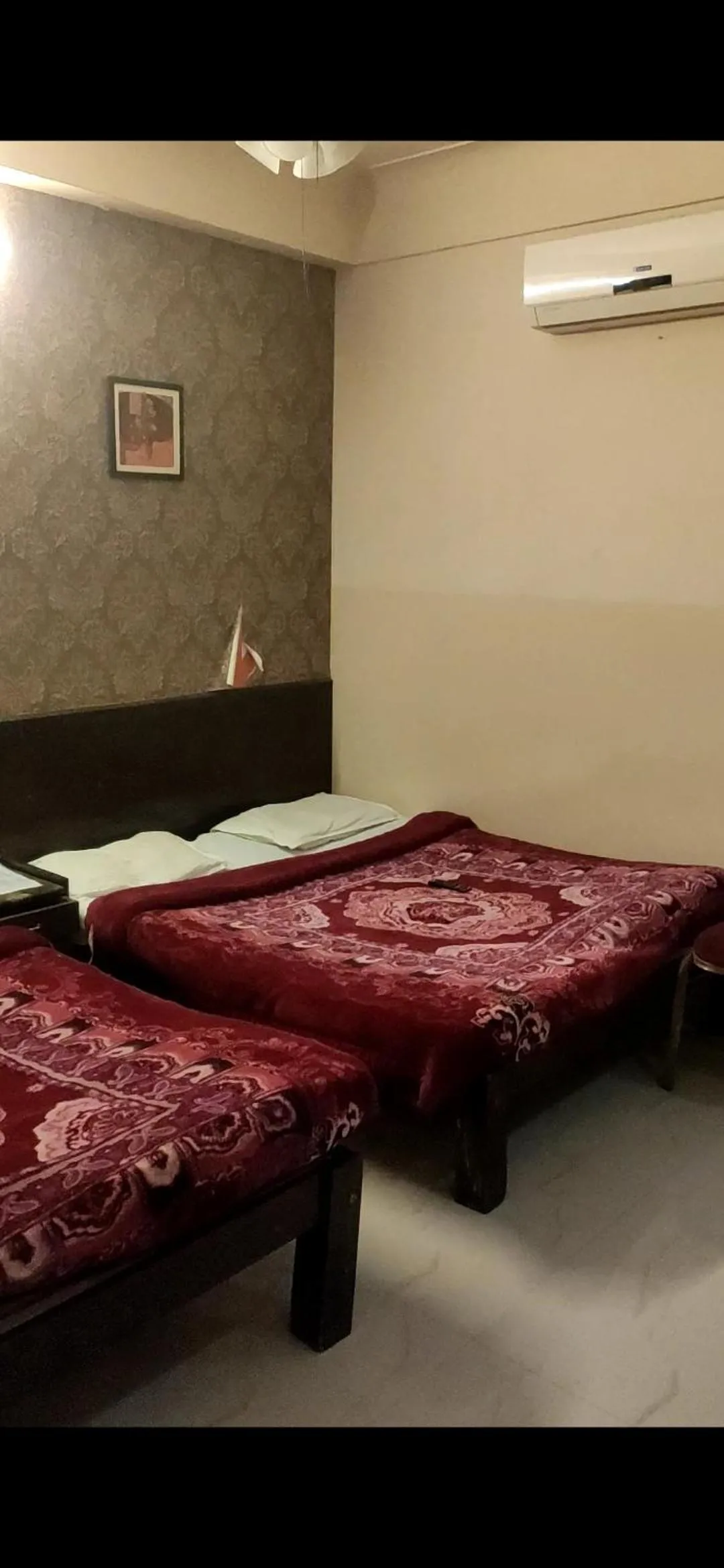 Bed in Raj Residency Mysuru