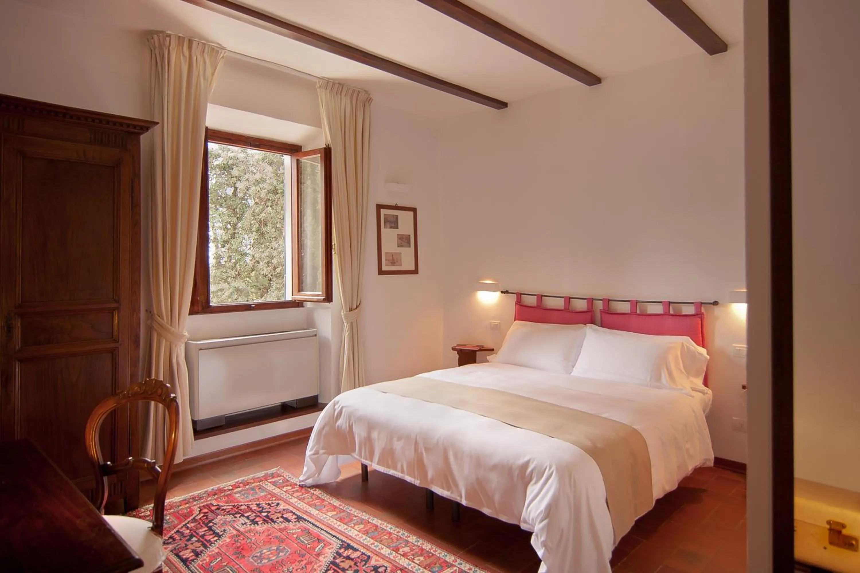 Bedroom, Bed in Villa I Barronci Resort & Spa