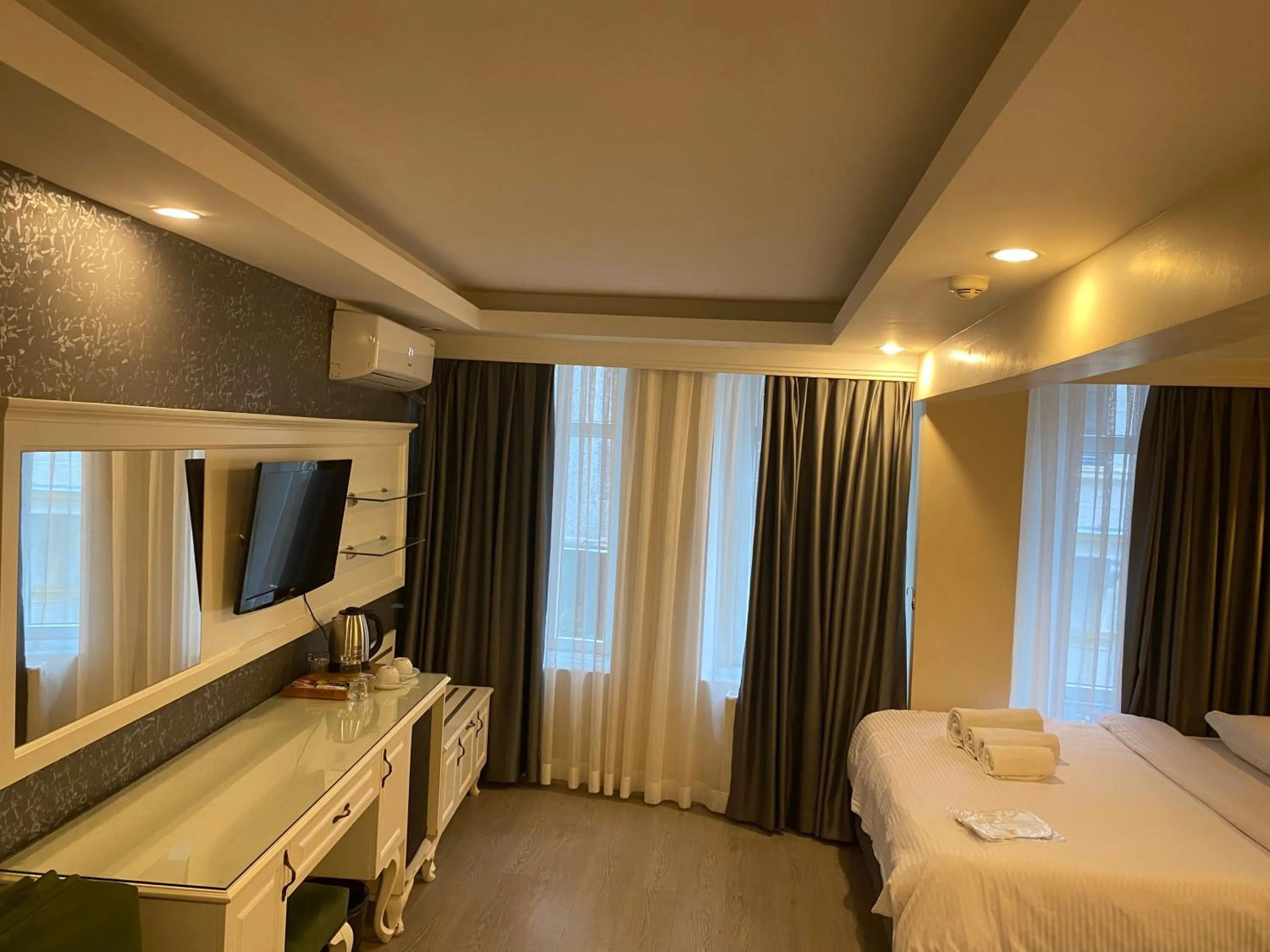 TV and multimedia, Bed in Lazz City Hotel