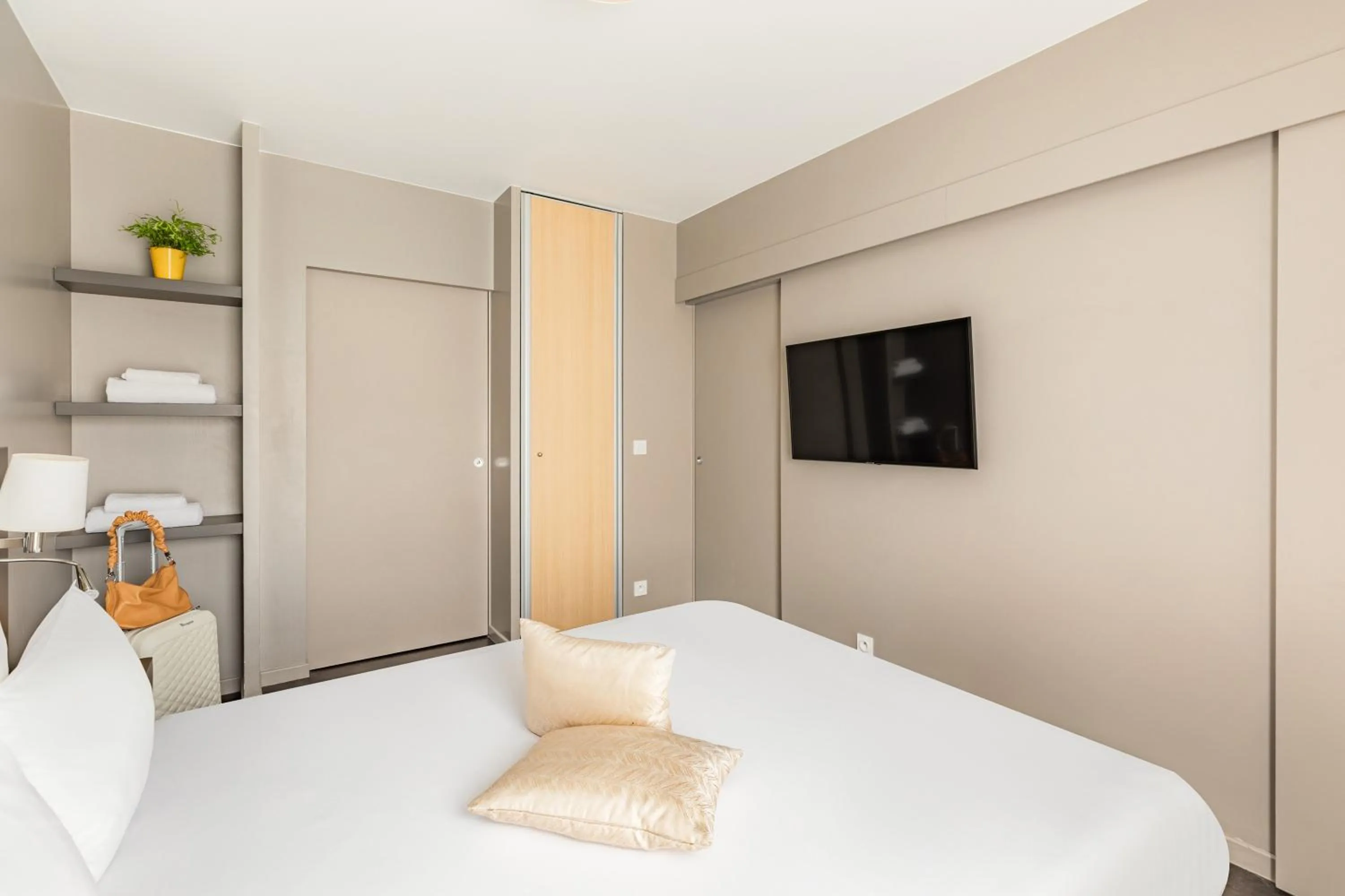 Bed in Appart’City Confort Le Bourget - Aéroport