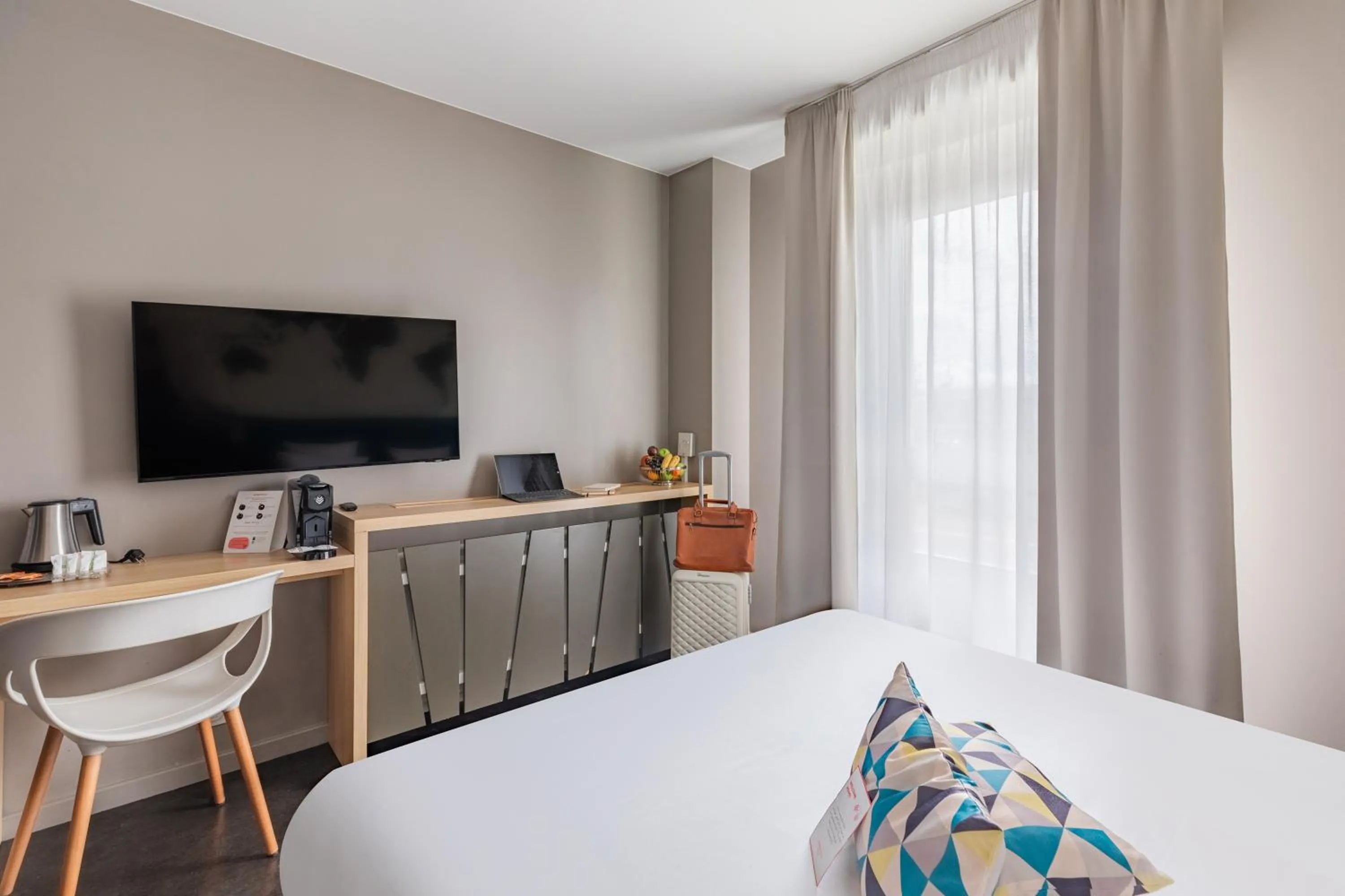 Bed in Appart’City Confort Le Bourget - Aéroport