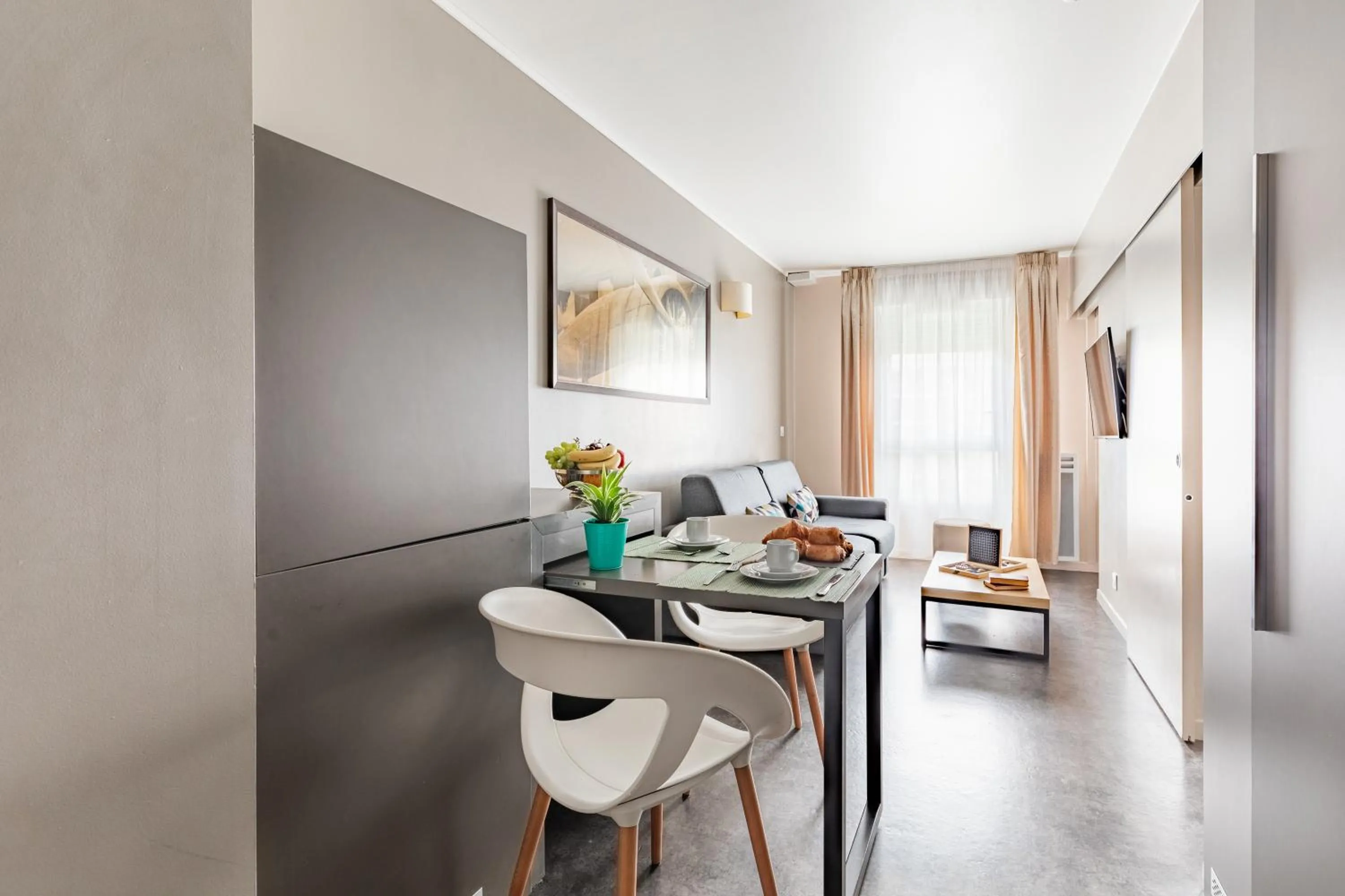 Living room in Appart’City Confort Le Bourget - Aéroport