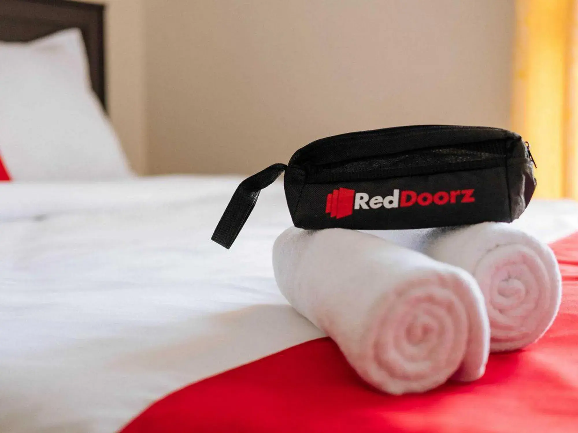 Bed in RedDoorz at Hotel Rumberpon Sorong Bed in RedDoorz at Hotel Rumberpon Sorong