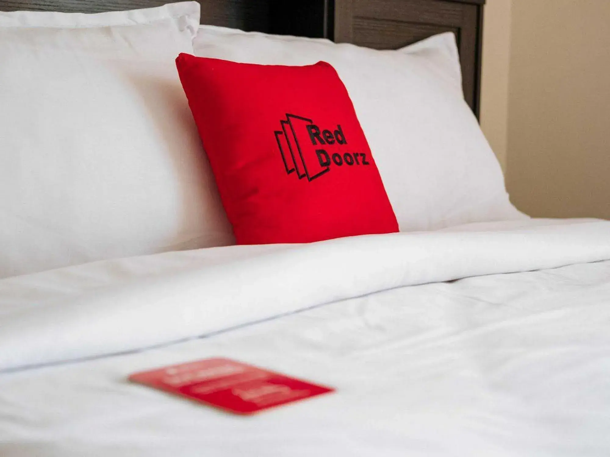 Bed in RedDoorz at Hotel Rumberpon Sorong Bed in RedDoorz at Hotel Rumberpon Sorong