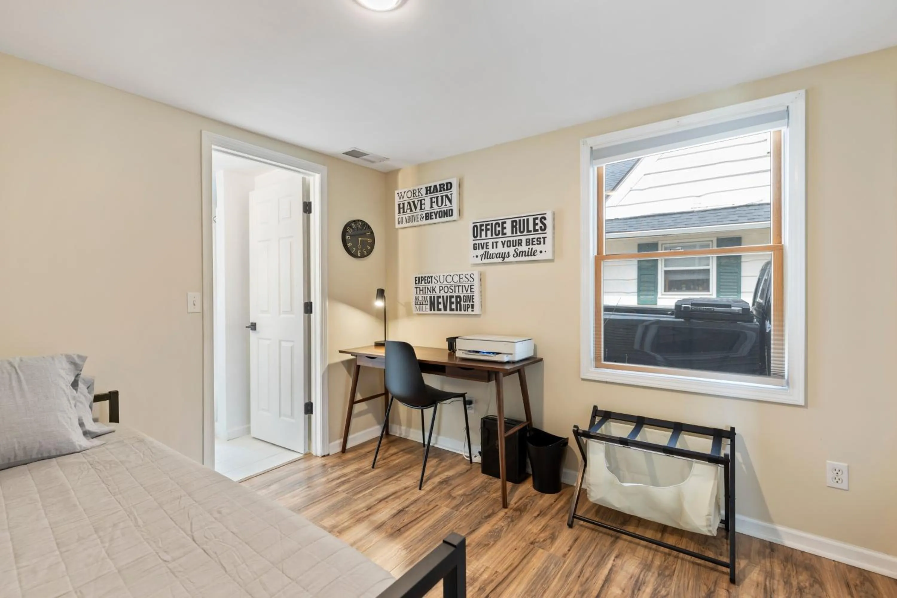 Seating area, Bed in Perfect Location Walk to MSU Campus High End Mattresses Fast Wi-Fi