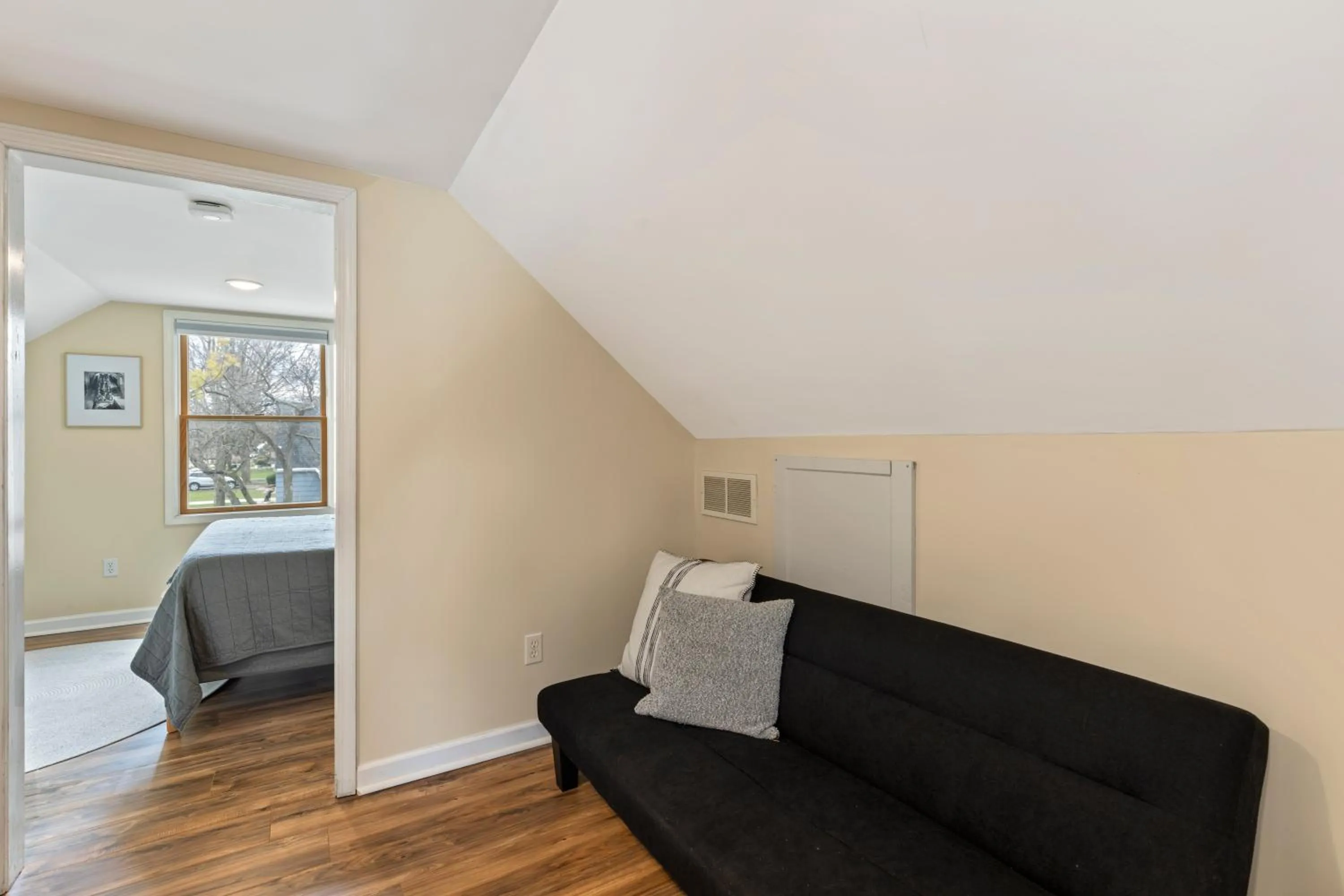 Seating area, Bed in Perfect Location Walk to MSU Campus High End Mattresses Fast Wi-Fi