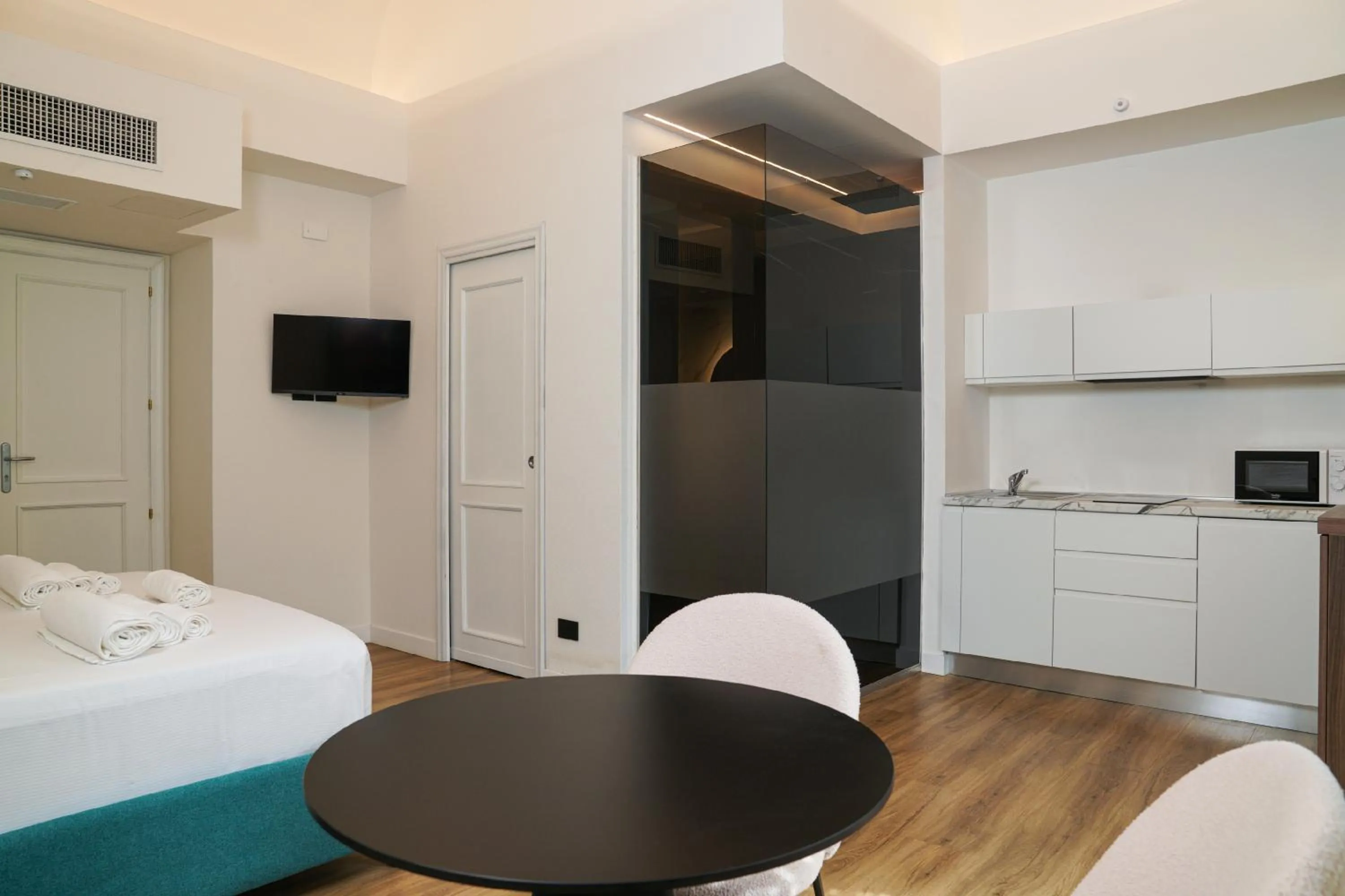 Kitchen or kitchenette, Bed in Hotel Il Tesoro Pompeiano