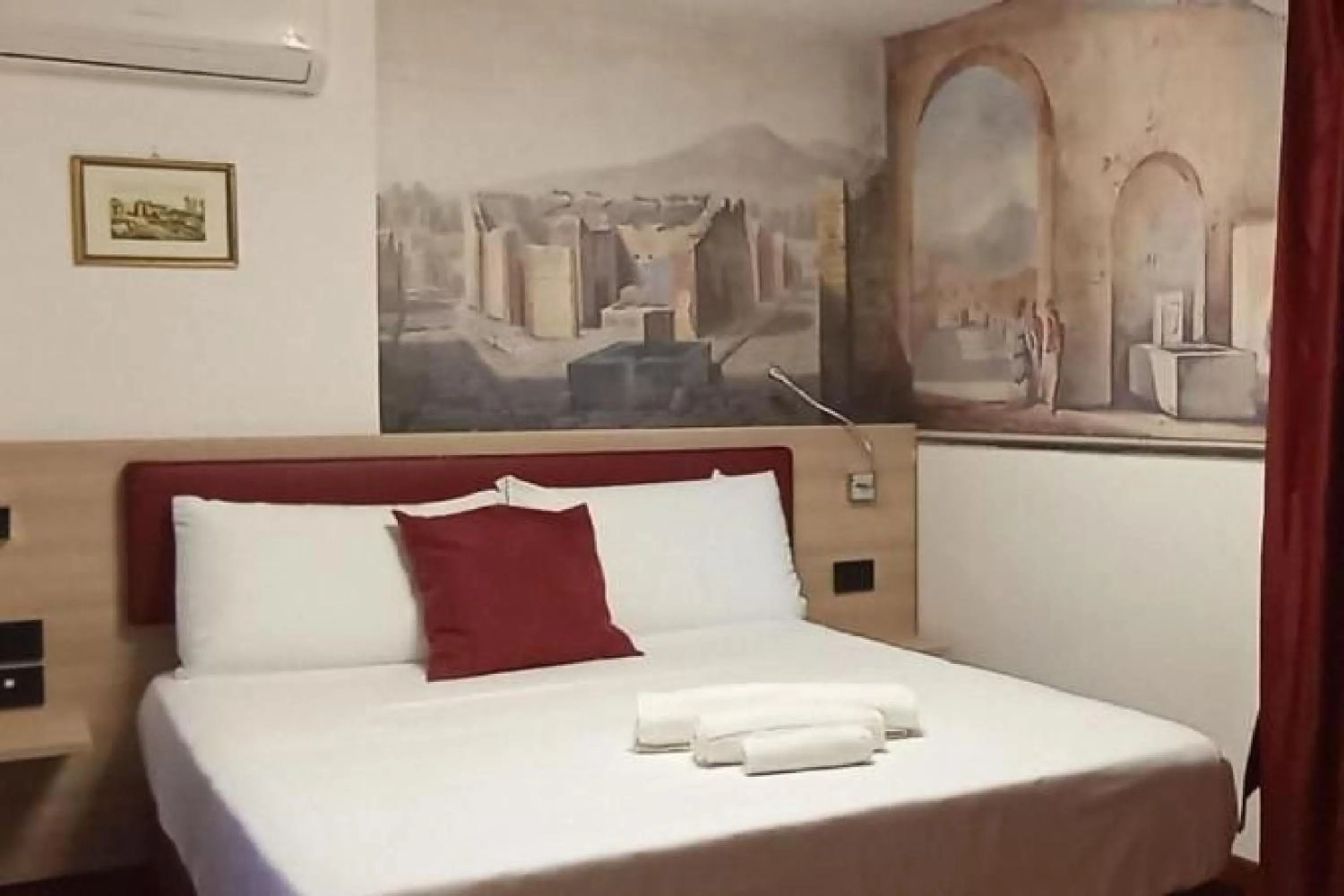 Bed in Hotel Il Tesoro Pompeiano