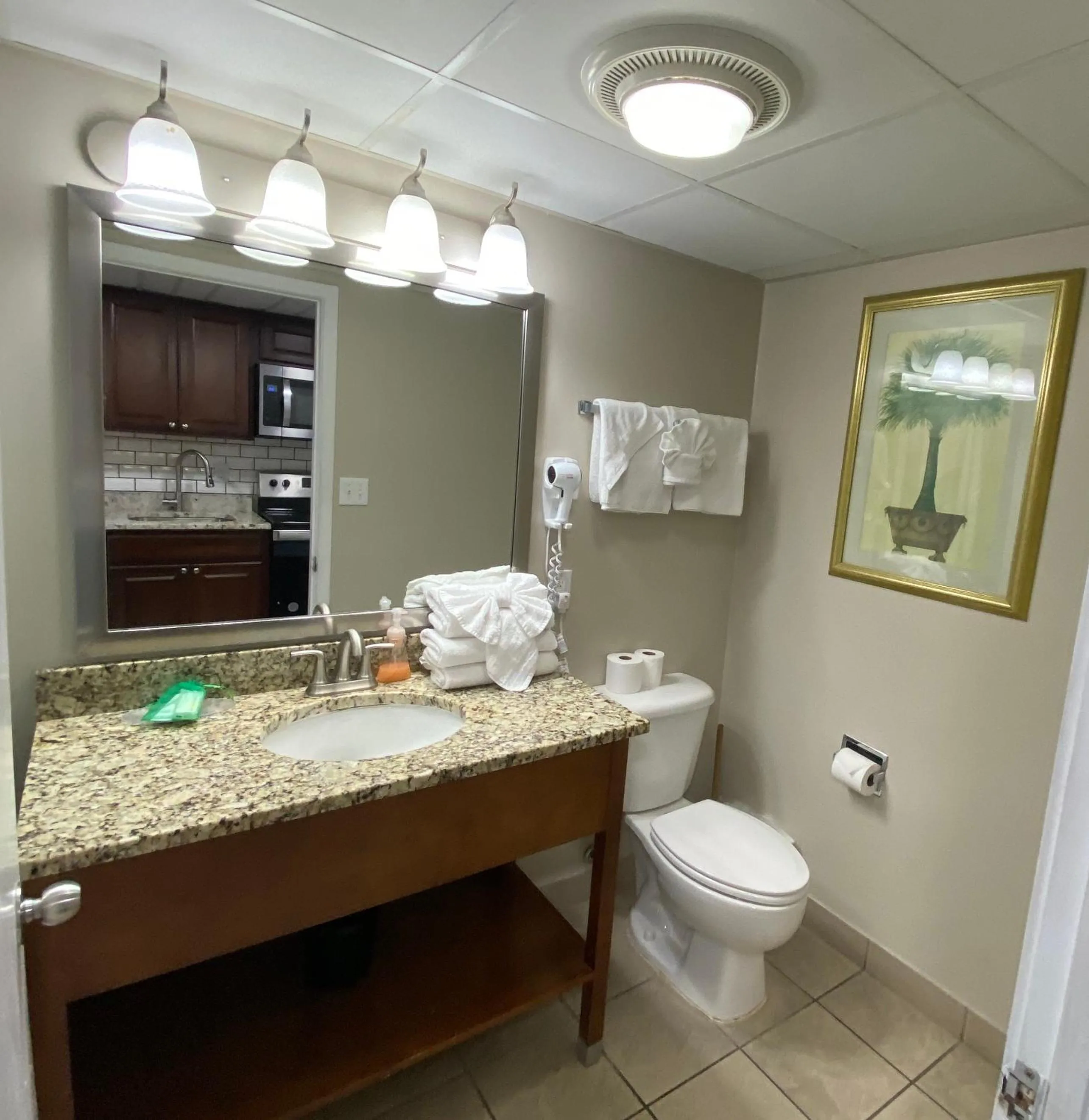 Toilet in Camelot By The Sea Ocean Front Condo