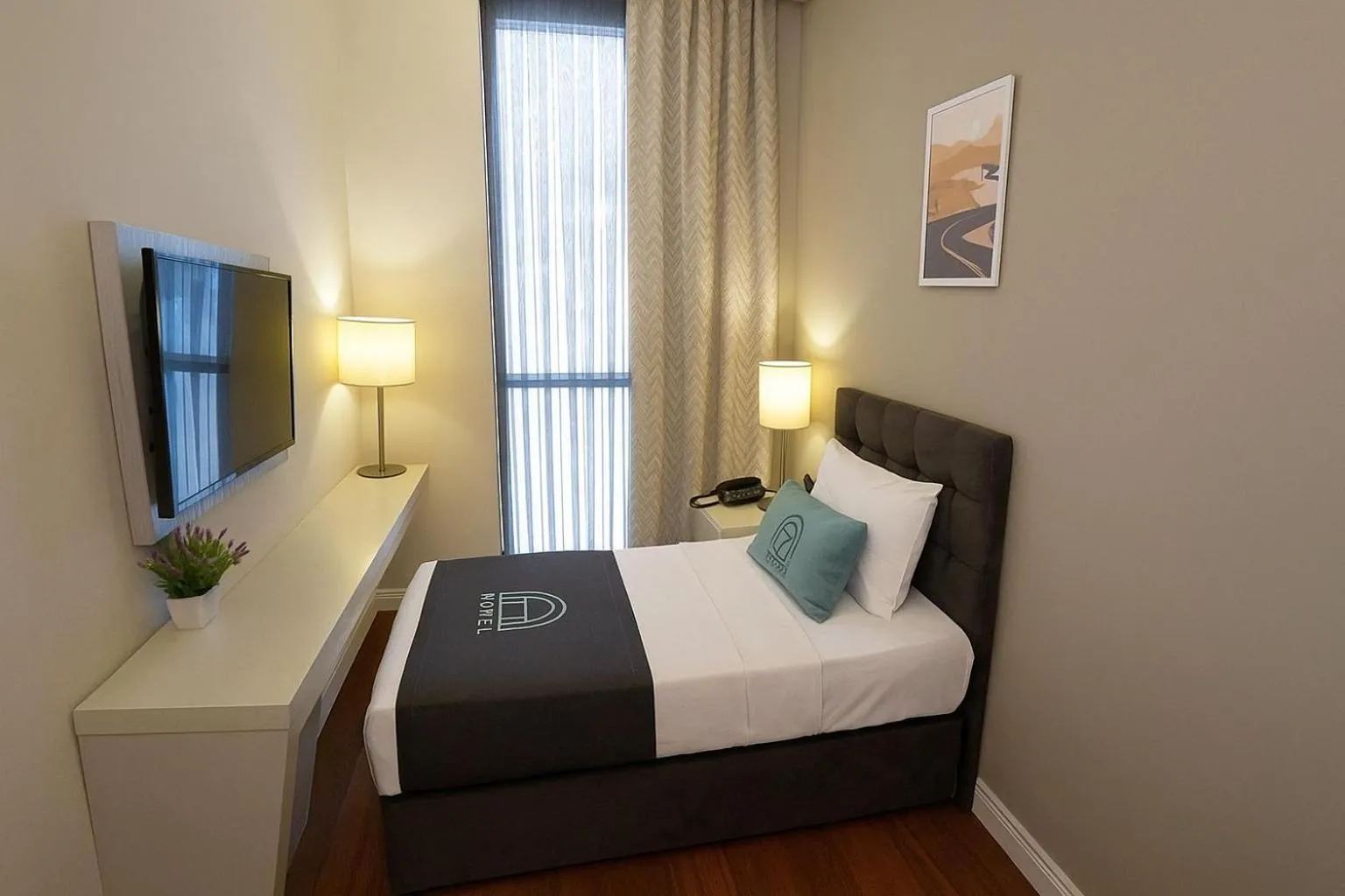 Photo of the whole room, Bed in Homey AirPort Hotel