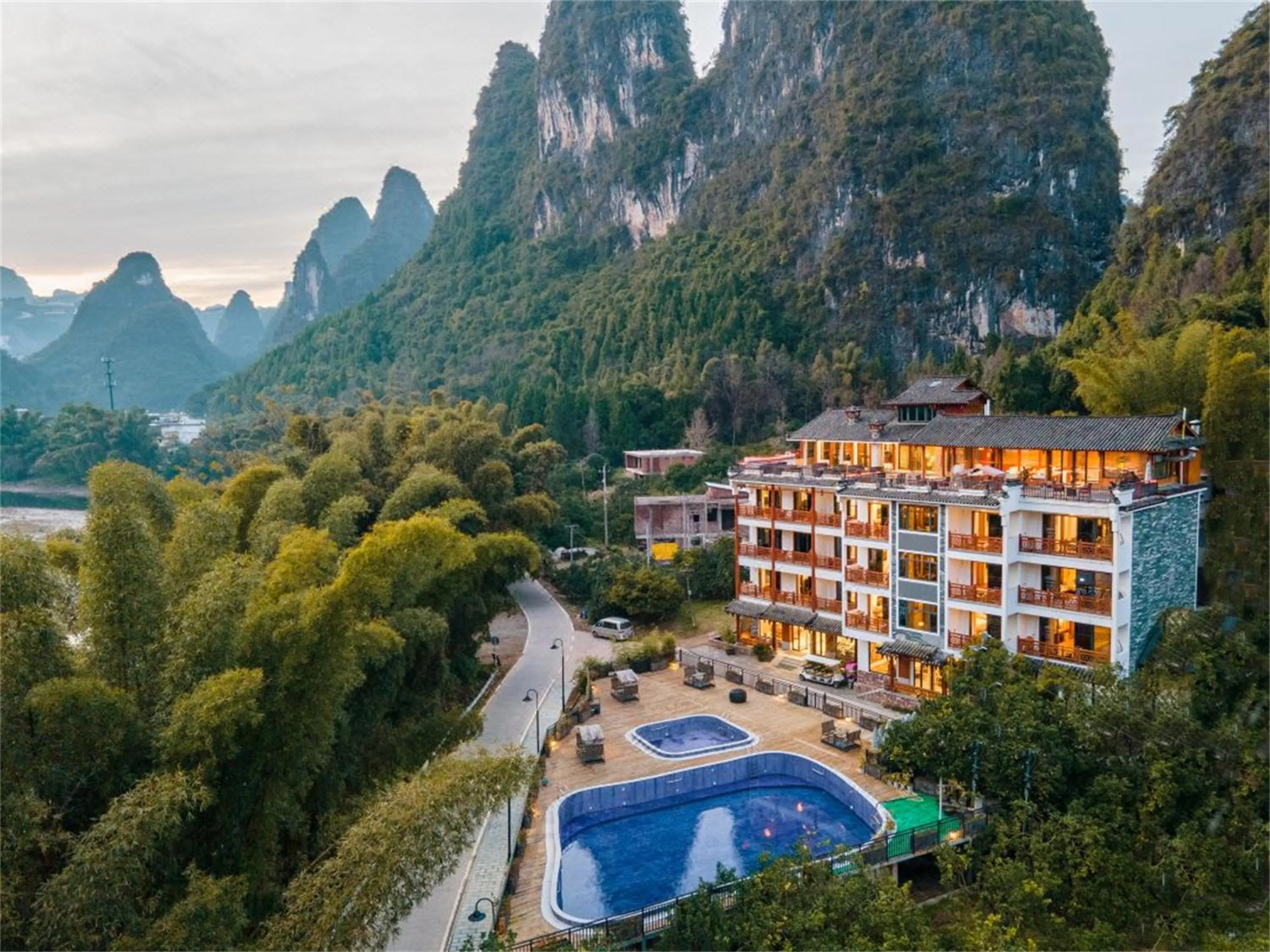 Property building in Yangshuo Mountain River Ballad Hotel - Free Yangshuo Train Station Pick Up and Drop Off
