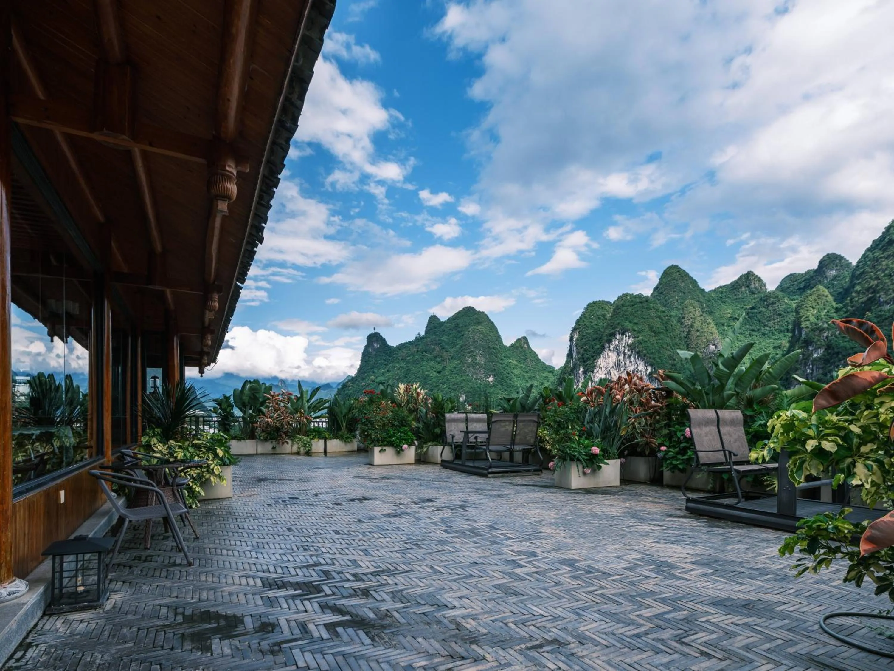 Balcony/Terrace in Yangshuo Mountain River Ballad Hotel - Free Yangshuo Train Station Pick Up and Drop Off