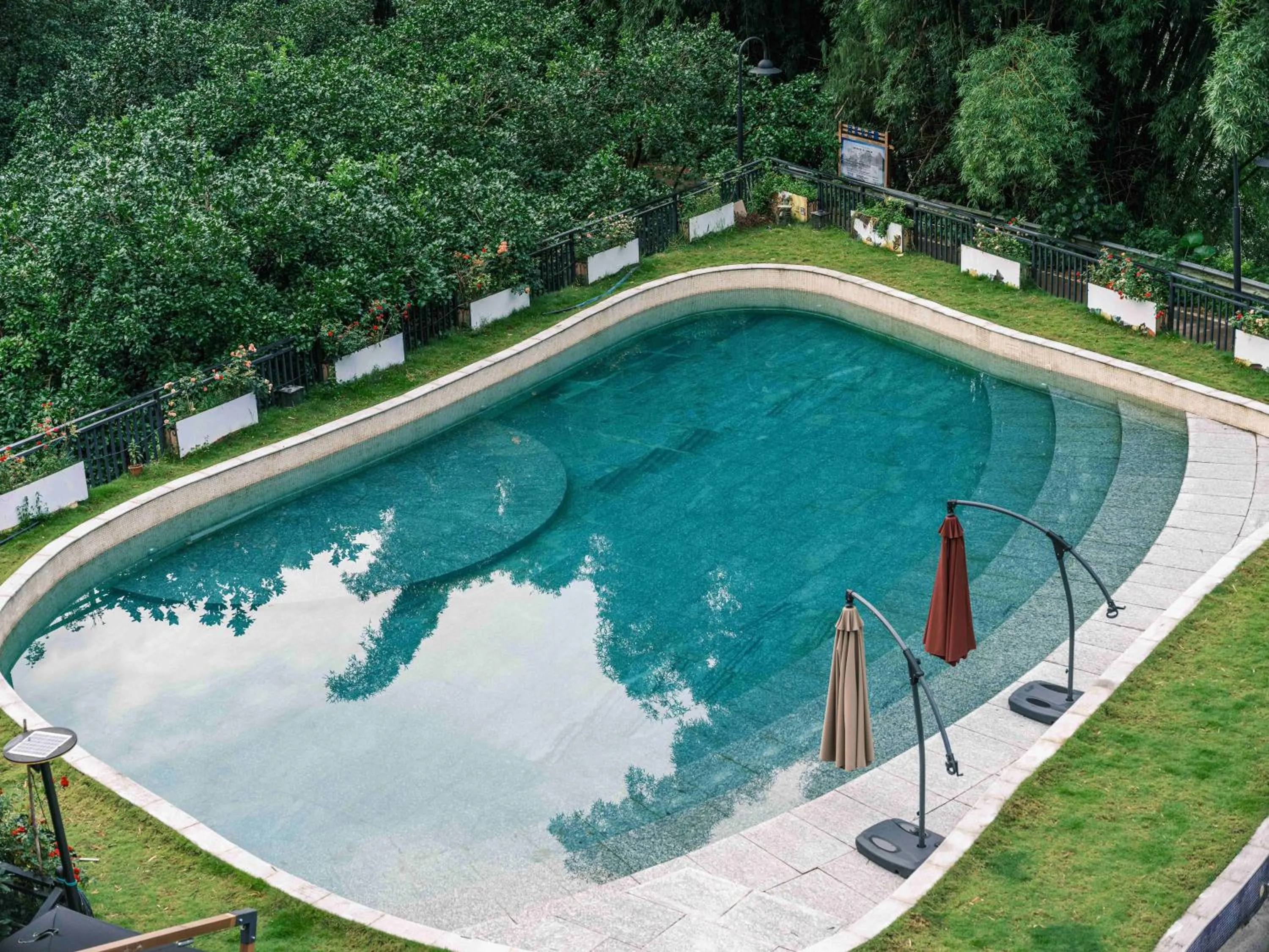 Pool view in Yangshuo Mountain River Ballad Hotel - Free Yangshuo Train Station Pick Up and Drop Off