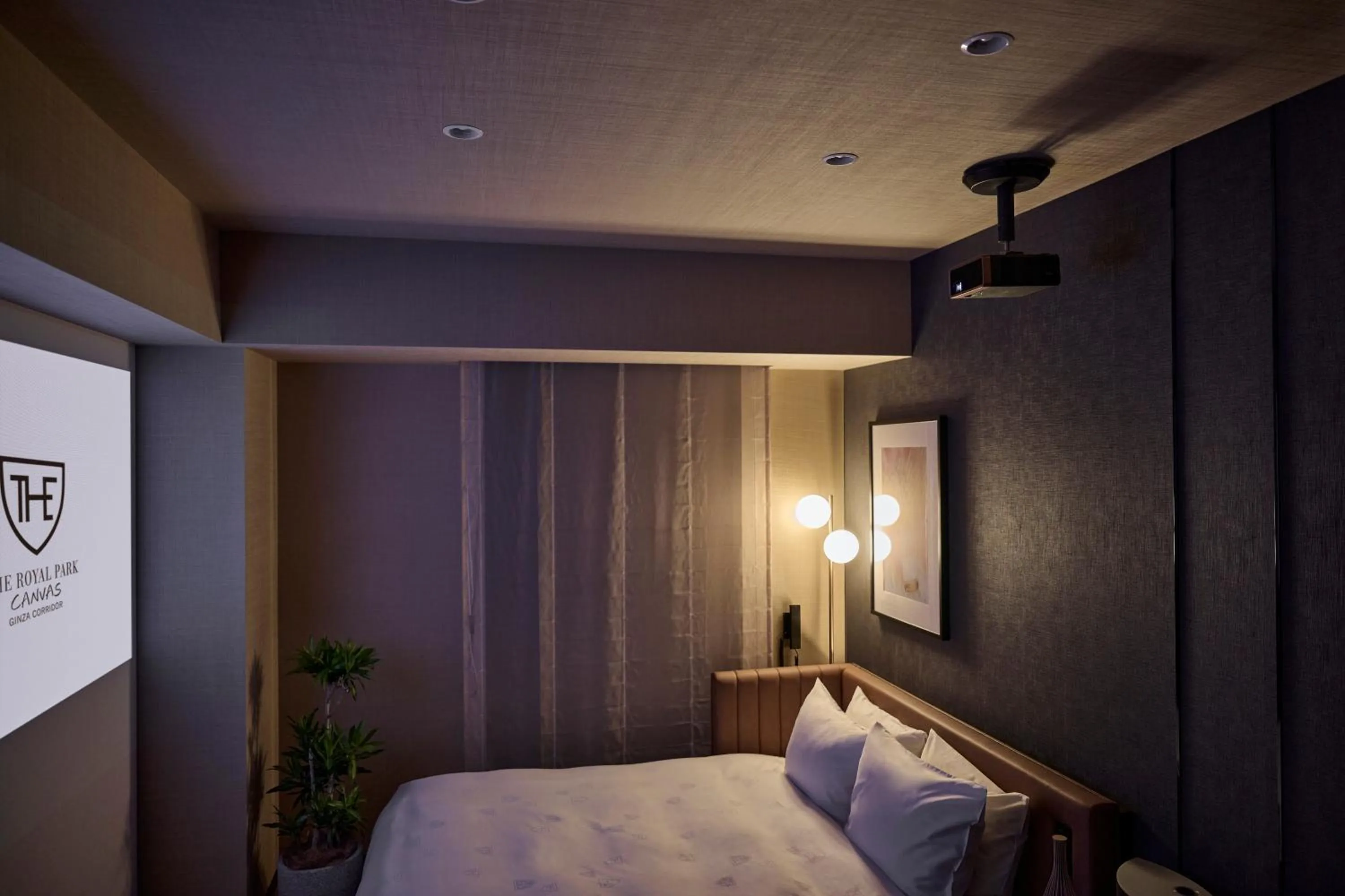Bed in The Royal Park Canvas Ginza Corridor