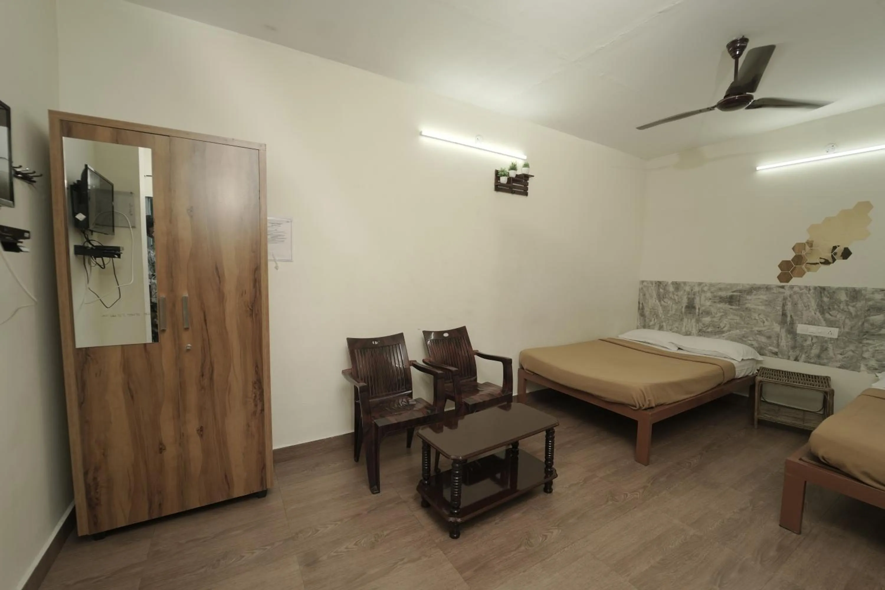 Bed in JUNGLE PARADISE FARM & GUEST HOUSE