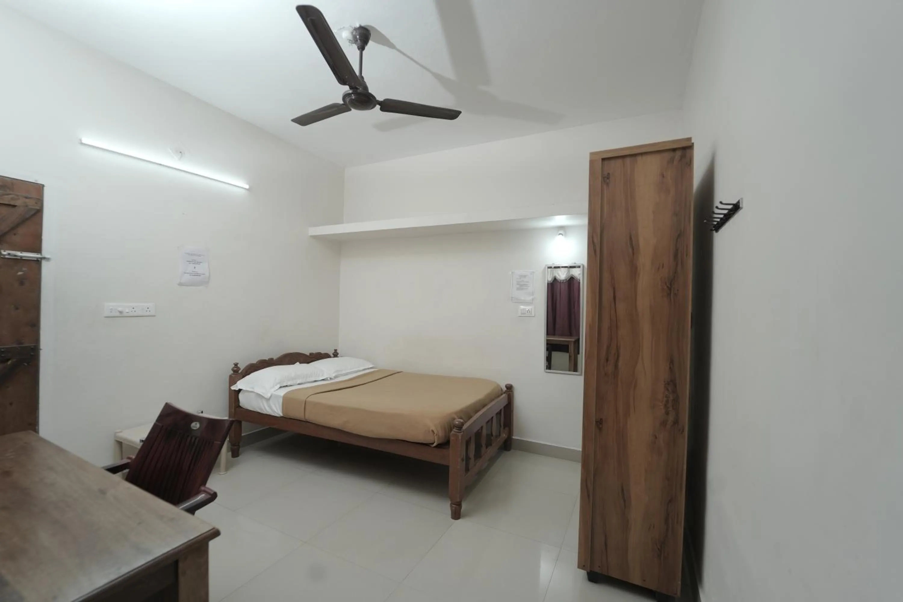 Bed in JUNGLE PARADISE FARM & GUEST HOUSE