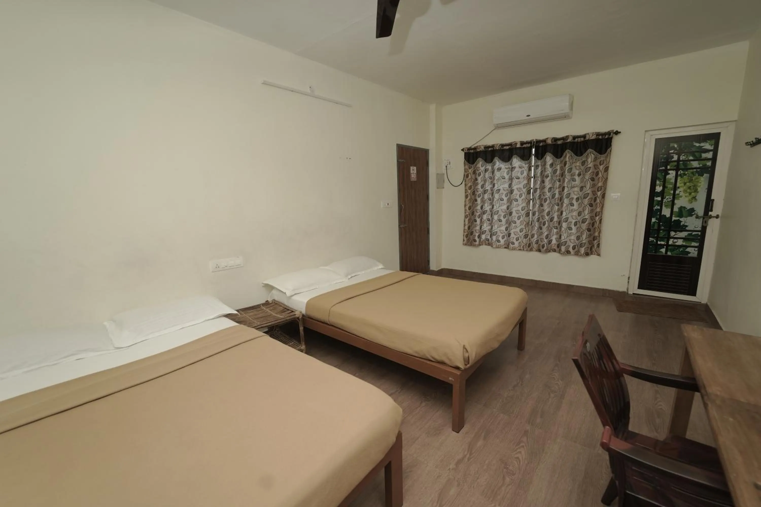 Bed in JUNGLE PARADISE FARM & GUEST HOUSE