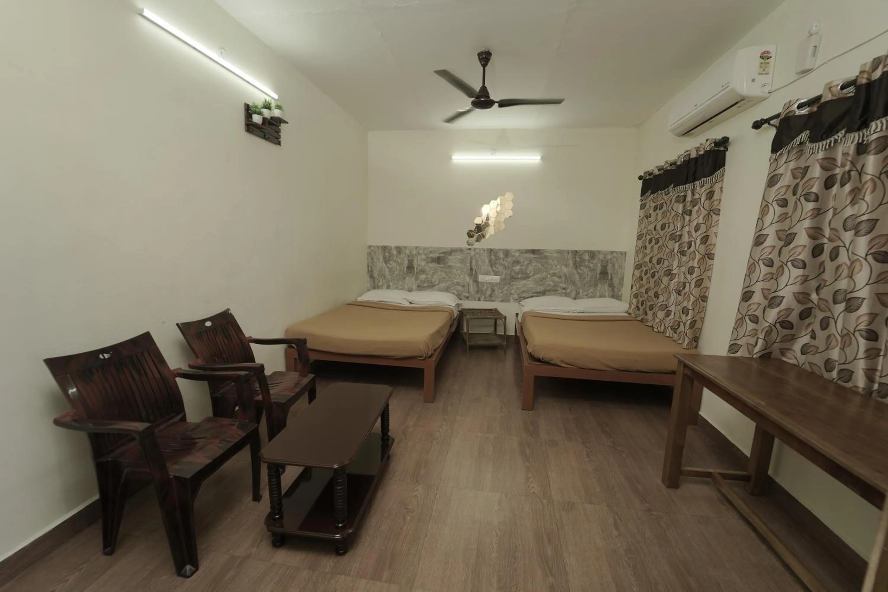 Seating area, Bed in JUNGLE PARADISE FARM & GUEST HOUSE