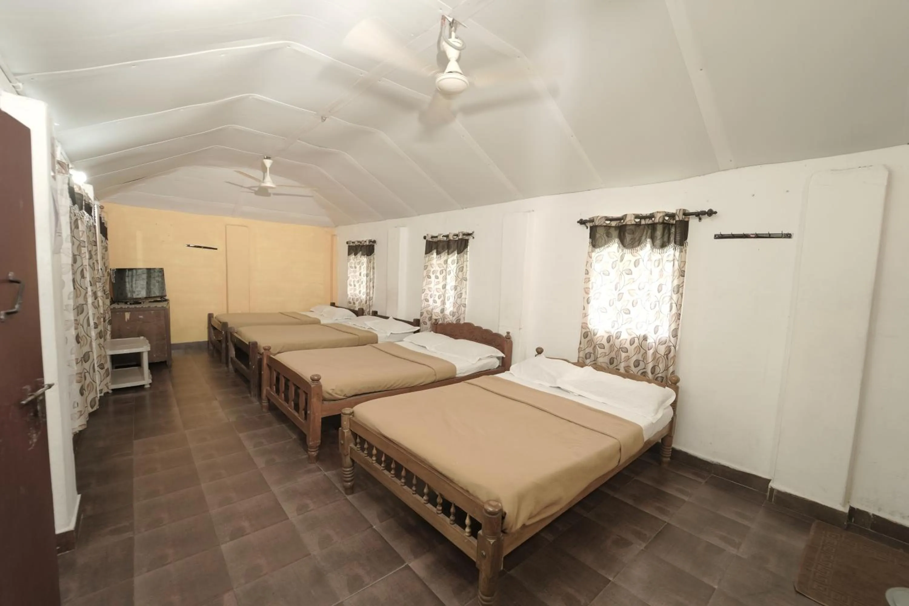 Bed in JUNGLE PARADISE FARM & GUEST HOUSE