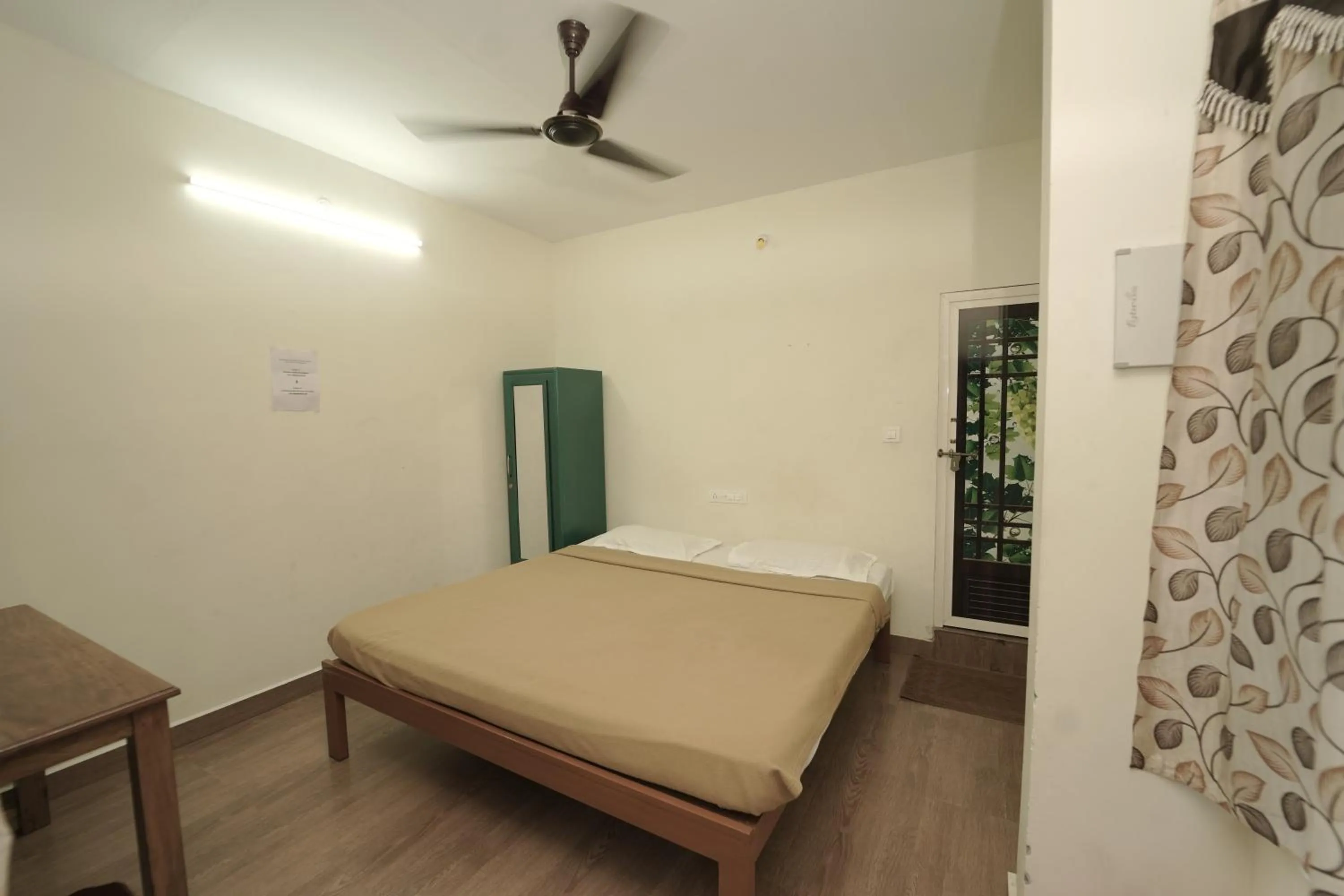 Bed in JUNGLE PARADISE FARM & GUEST HOUSE