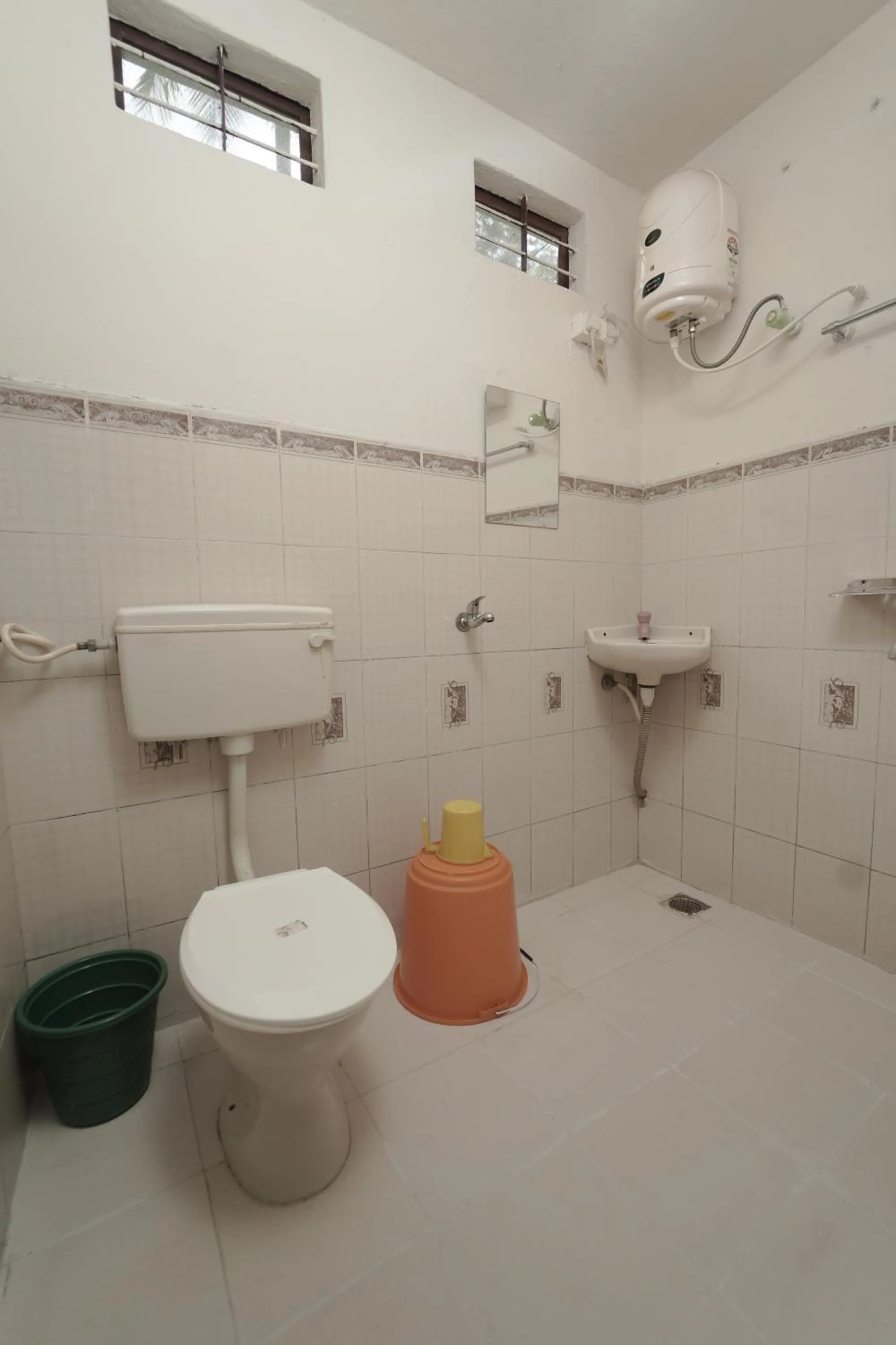 Toilet in JUNGLE PARADISE FARM & GUEST HOUSE