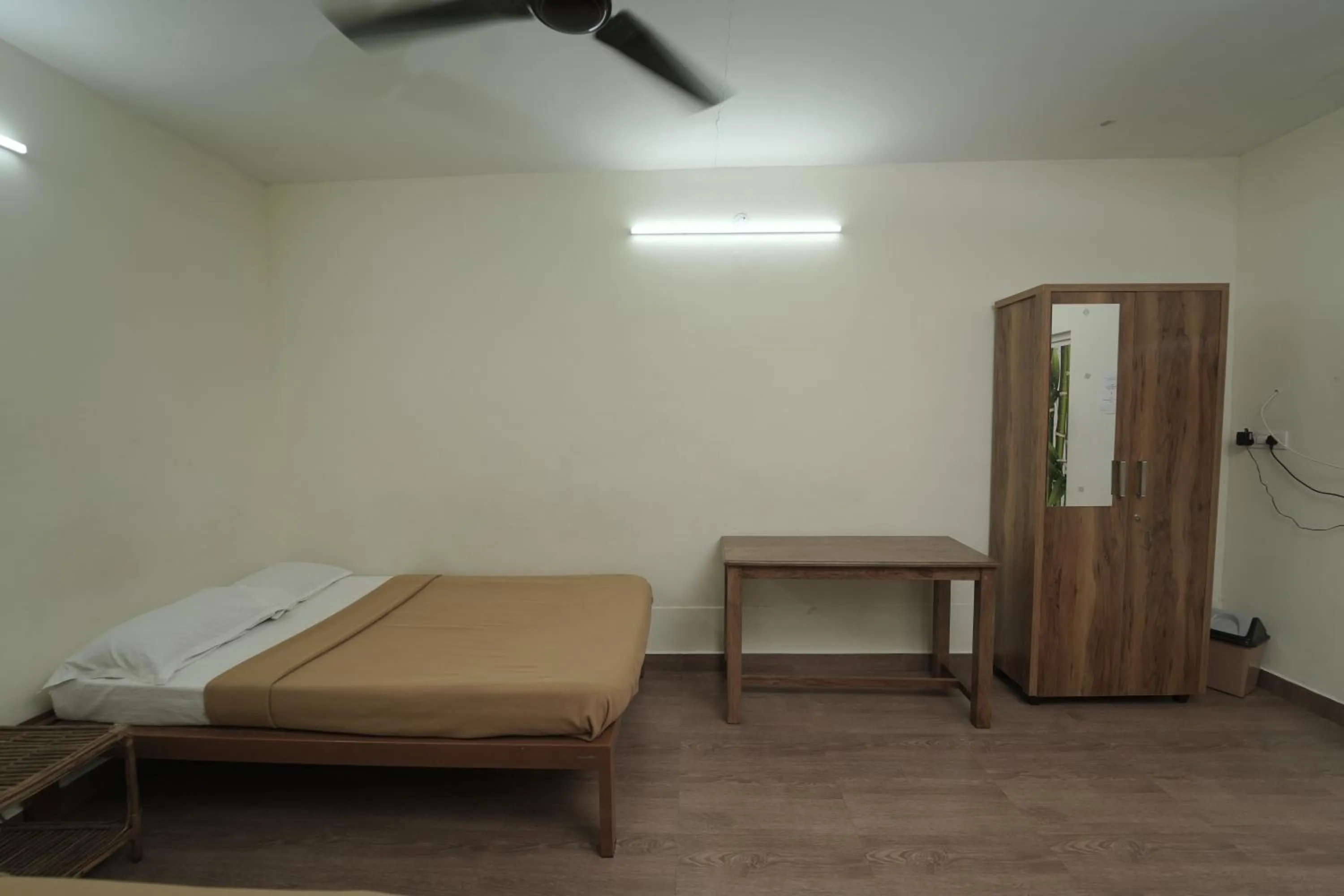 Bed in JUNGLE PARADISE FARM & GUEST HOUSE