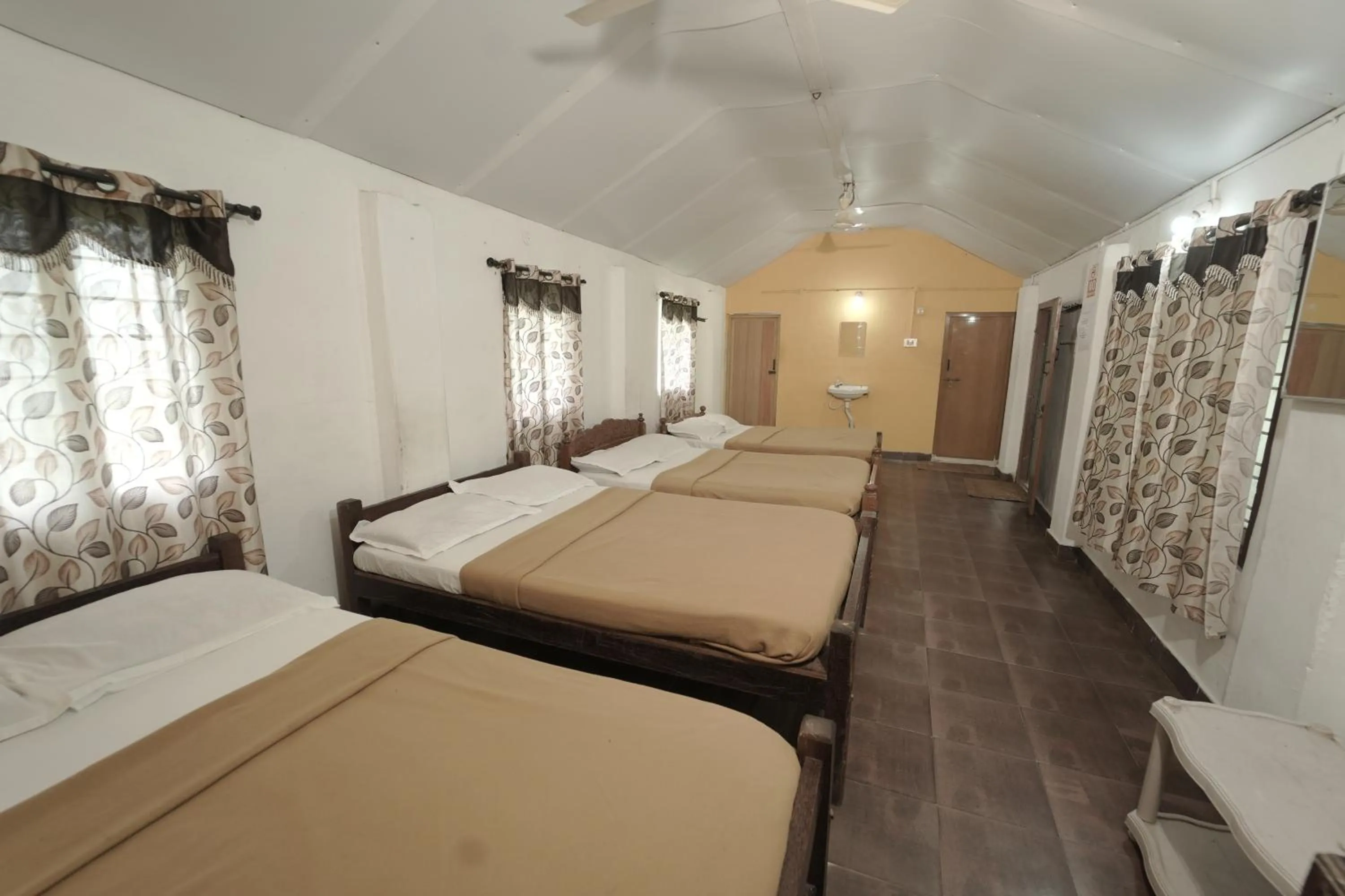 Bed in JUNGLE PARADISE FARM & GUEST HOUSE