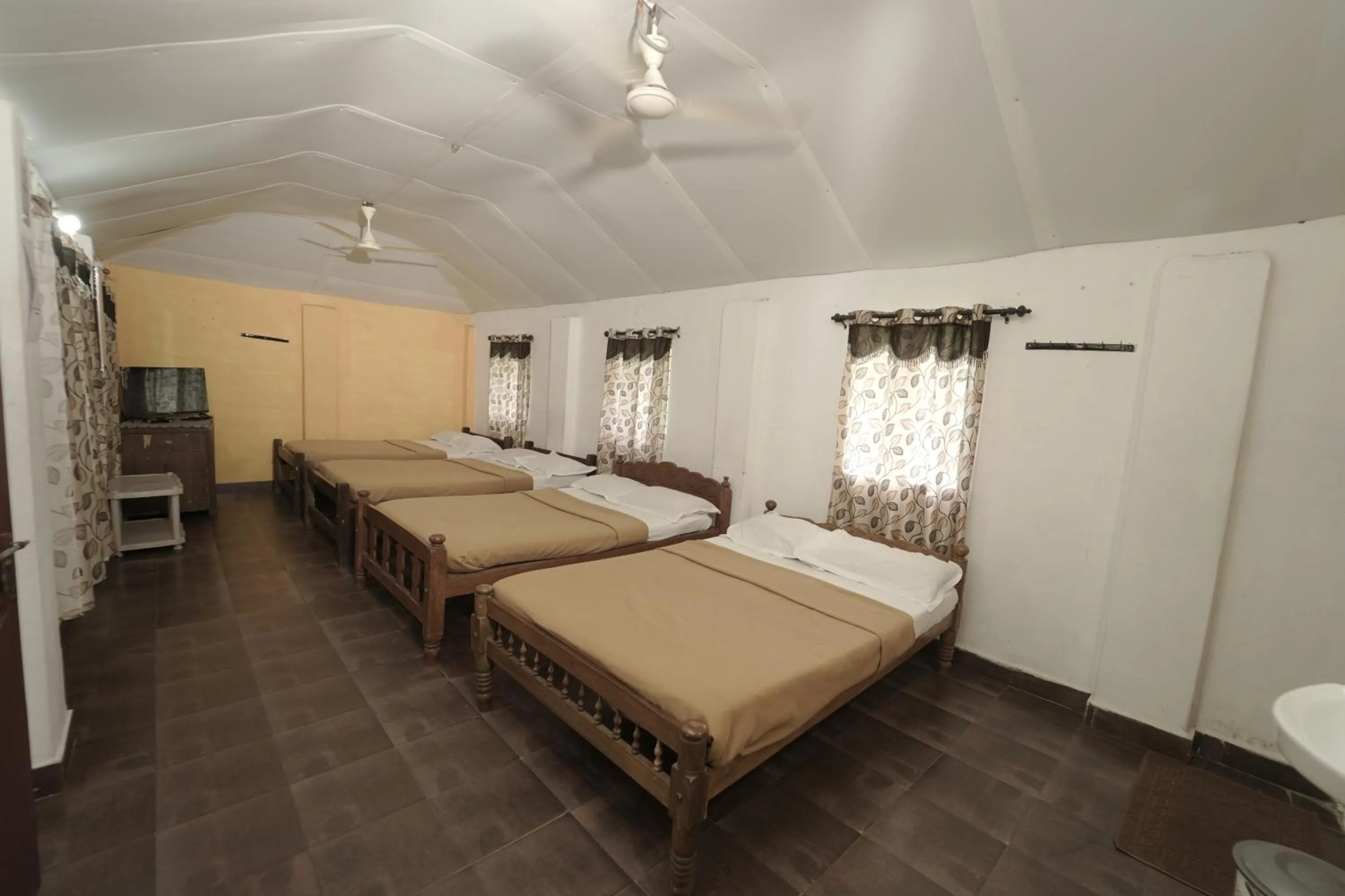 Bed in JUNGLE PARADISE FARM & GUEST HOUSE