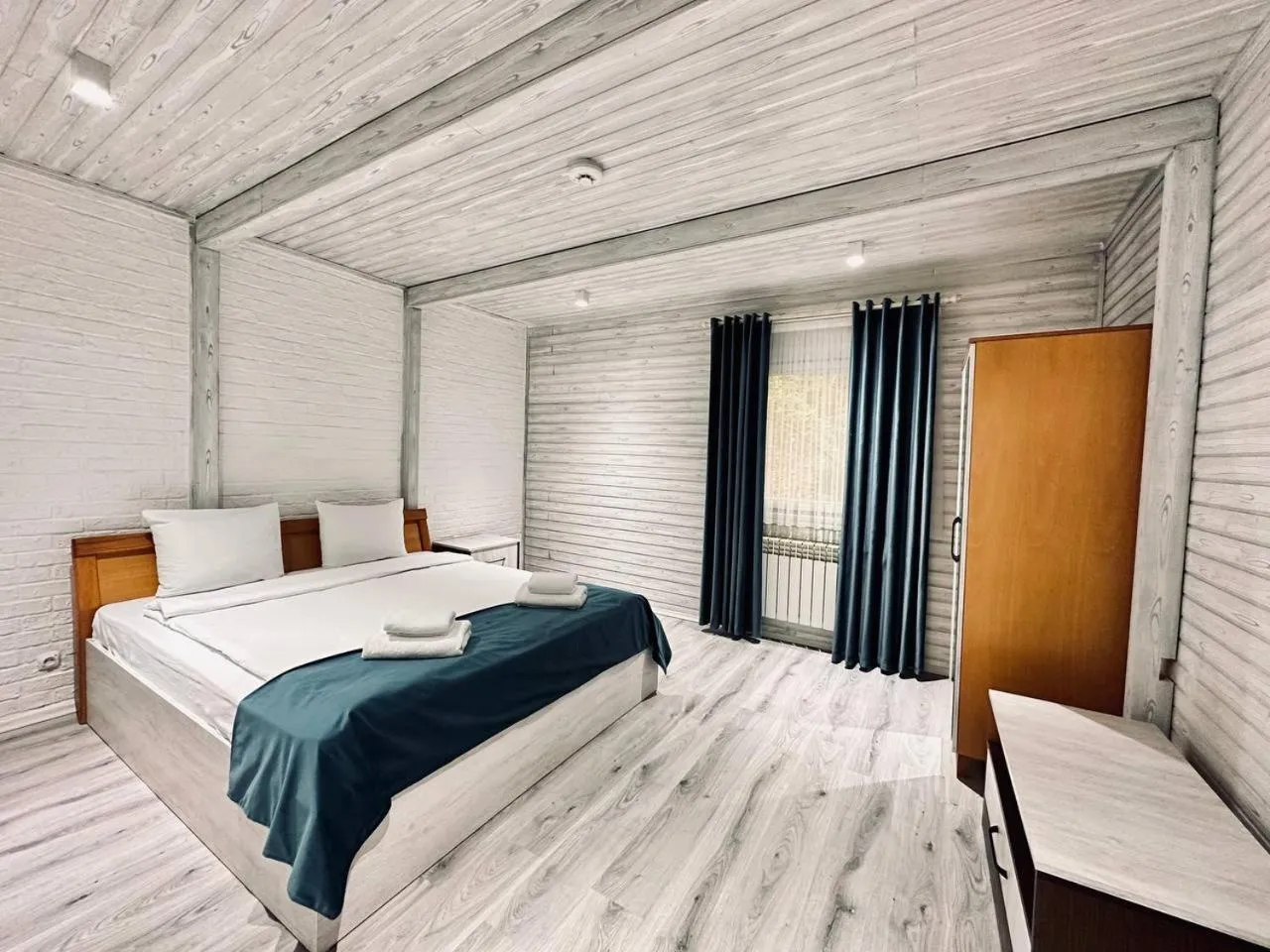 Bed in Deluxe Park Qusar Resort & Spa Hotel