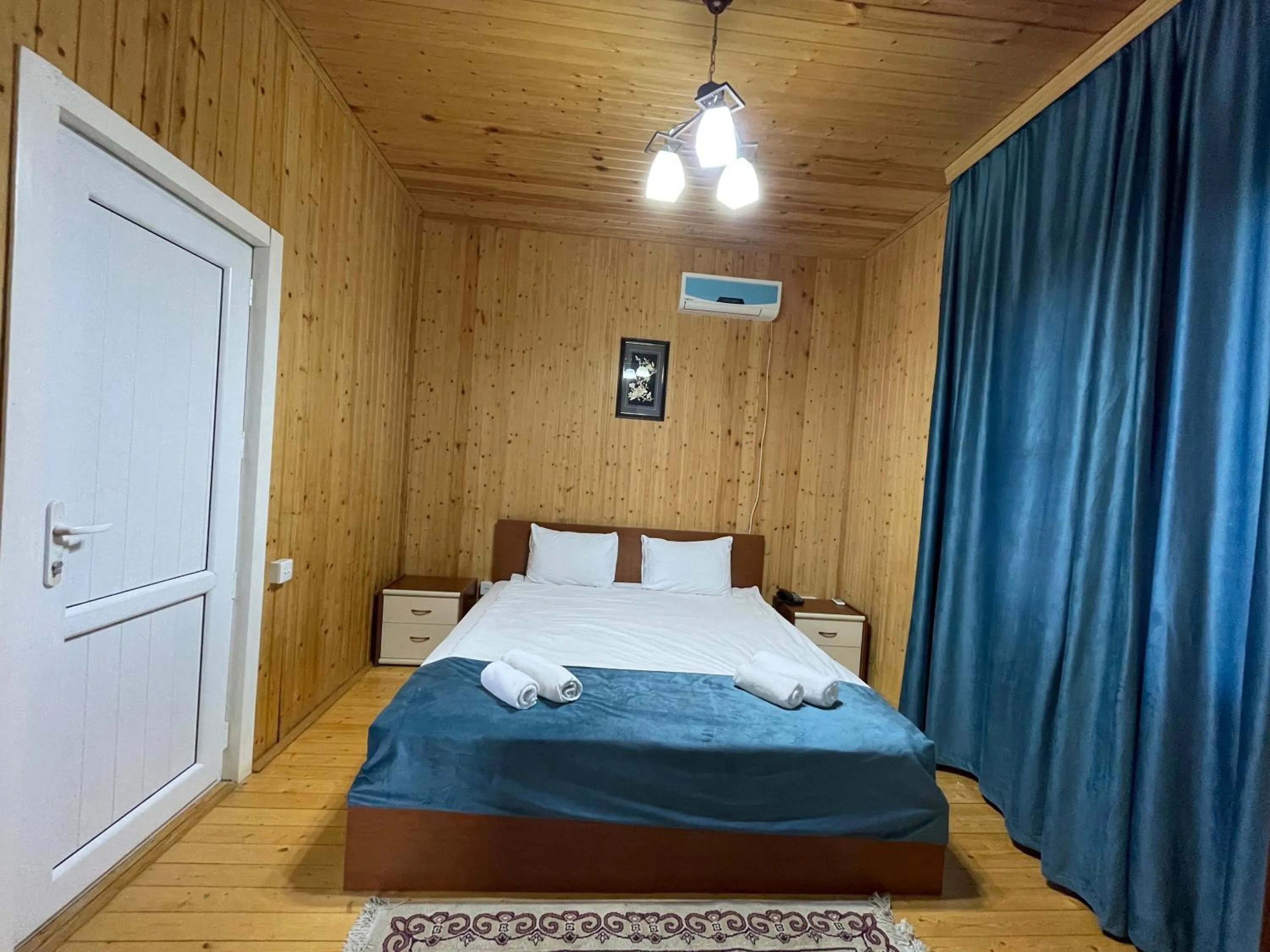 Bed in Deluxe Park Qusar Resort & Spa Hotel