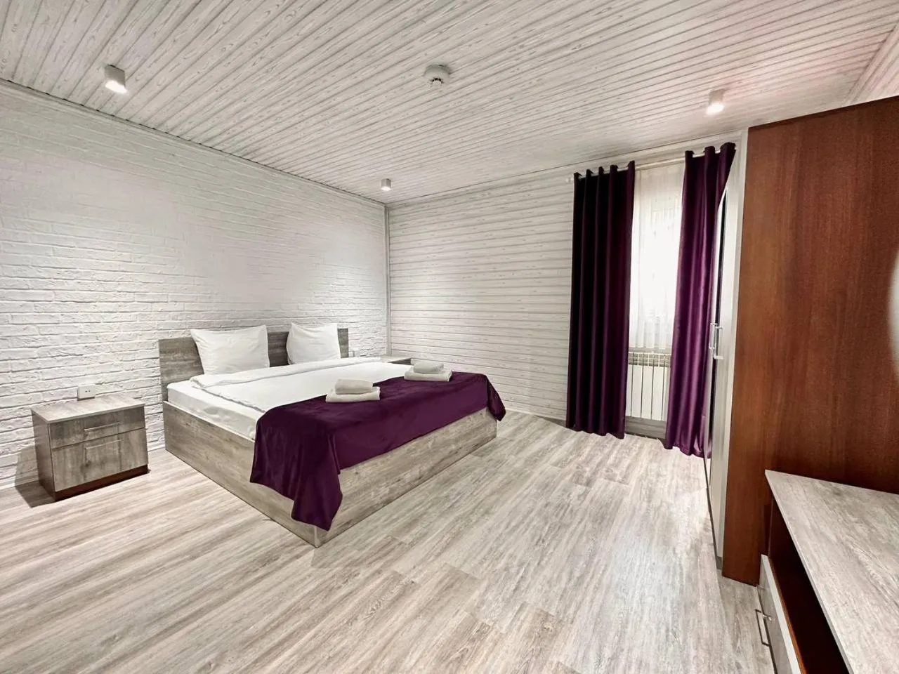 Bed in Deluxe Park Qusar Resort & Spa Hotel