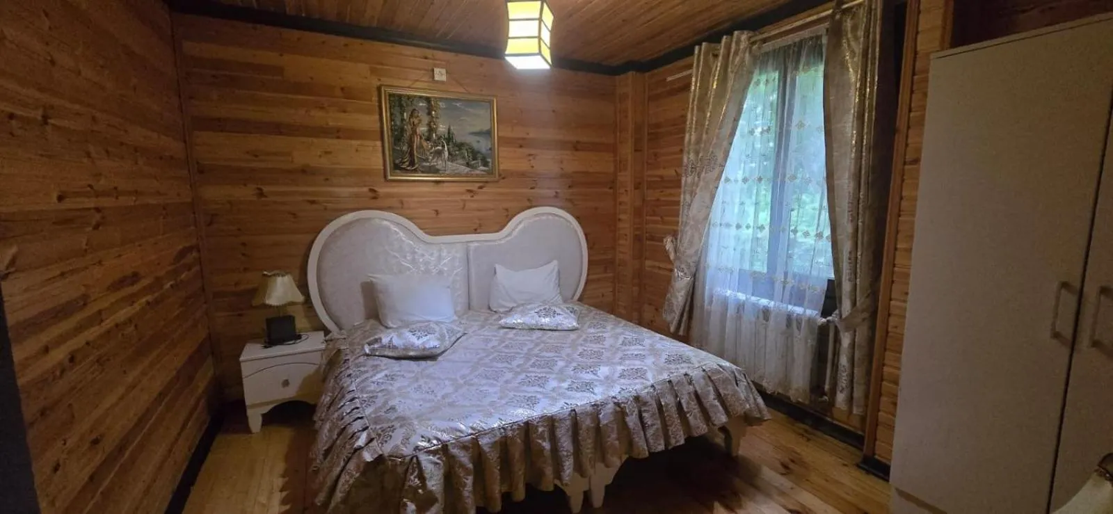 Bed in Deluxe Park Qusar Resort & Spa Hotel