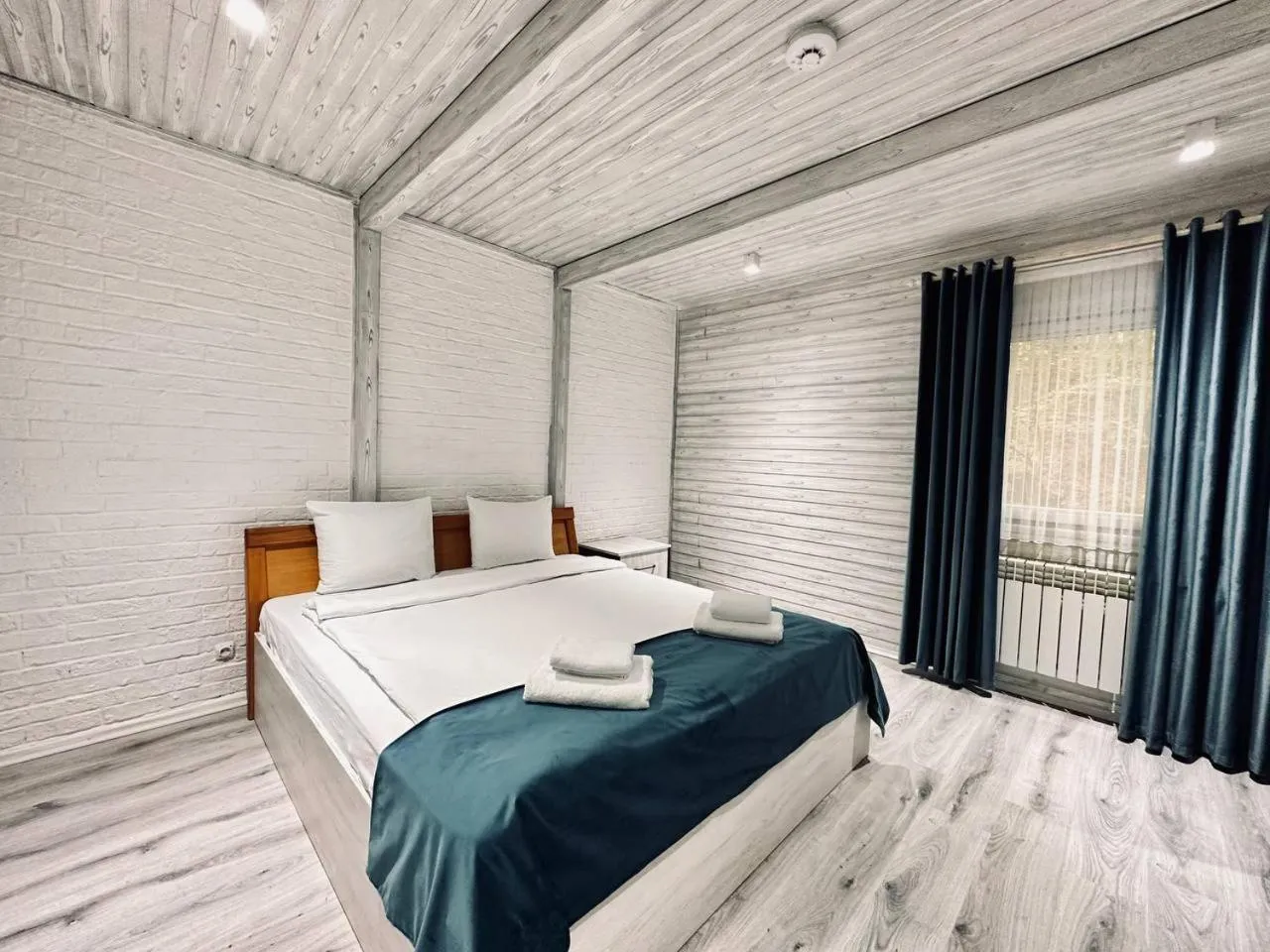 Bed in Deluxe Park Qusar Resort & Spa Hotel