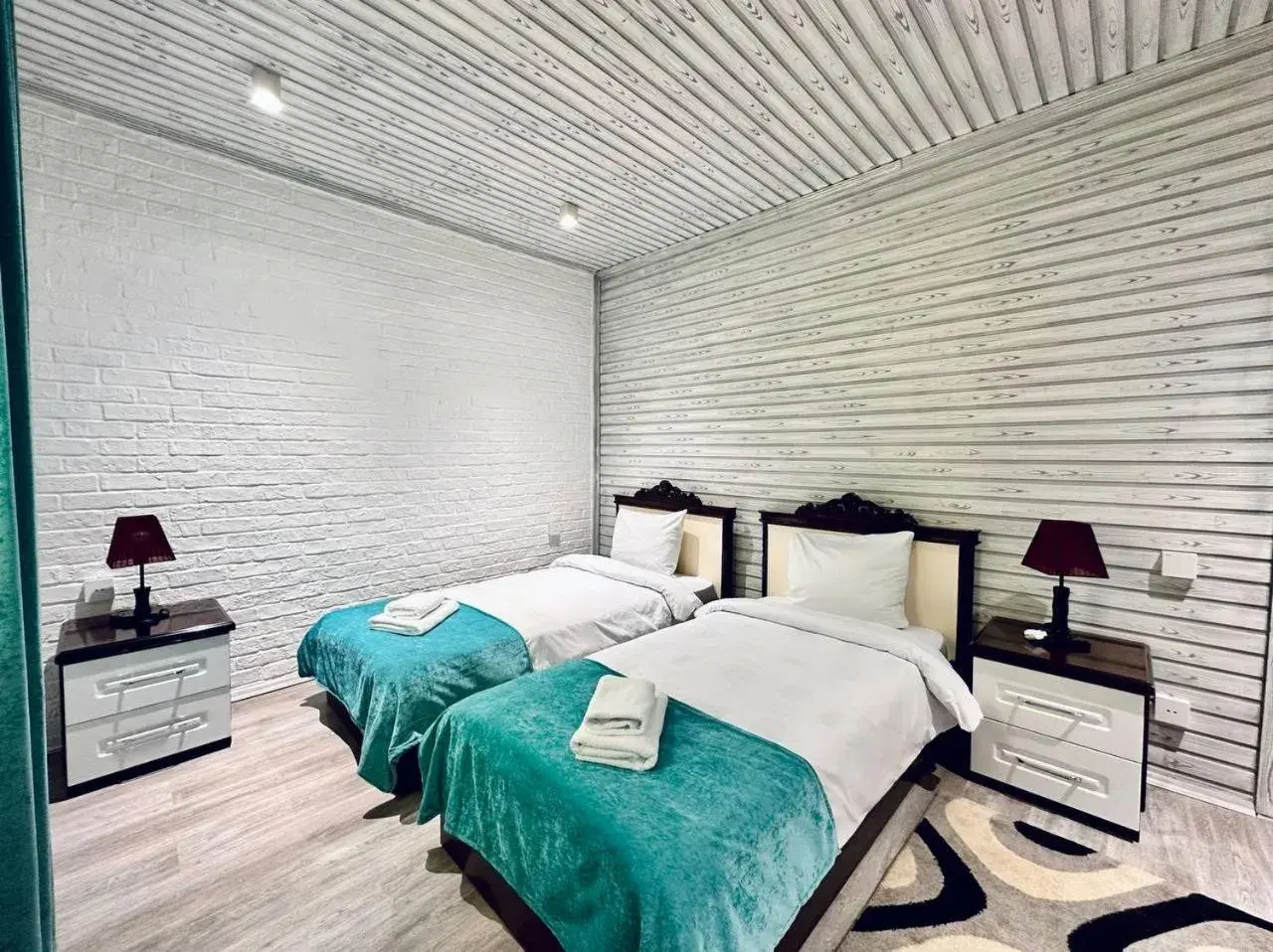 Bed in Deluxe Park Qusar Resort & Spa Hotel Bed in Deluxe Park Qusar Resort & Spa Hotel