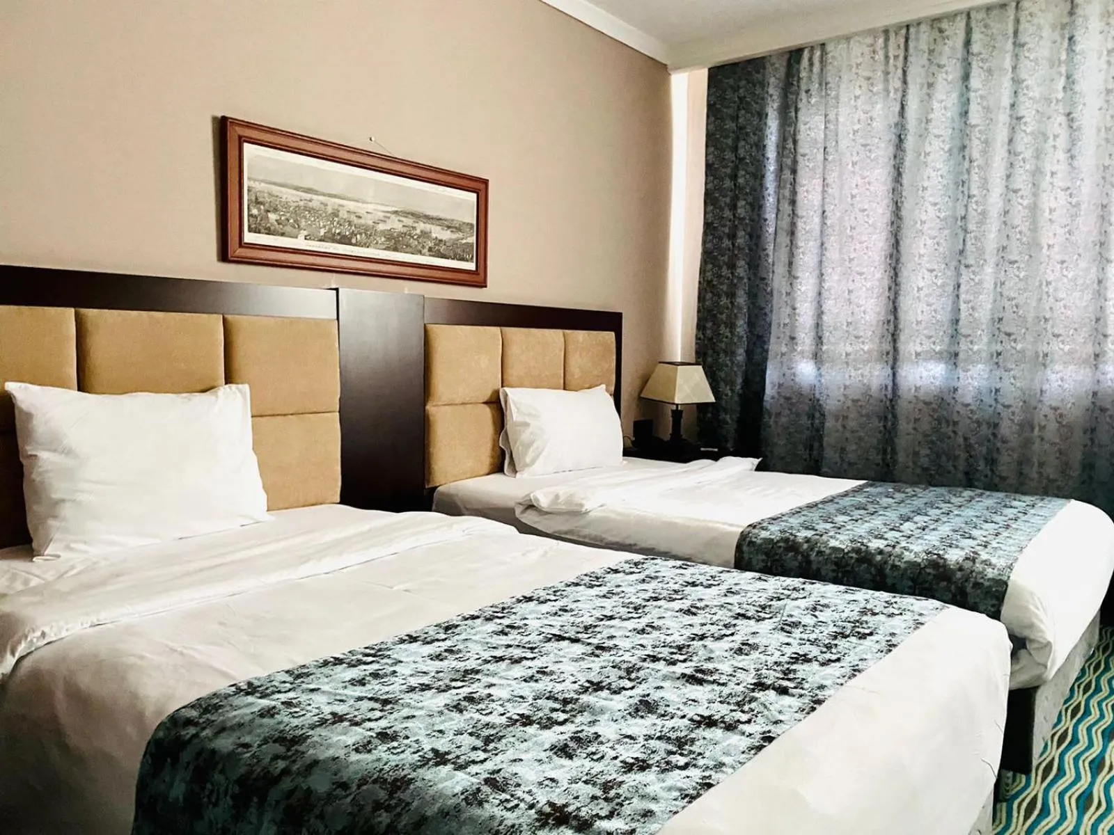 Bed in Ruma Port Hotel