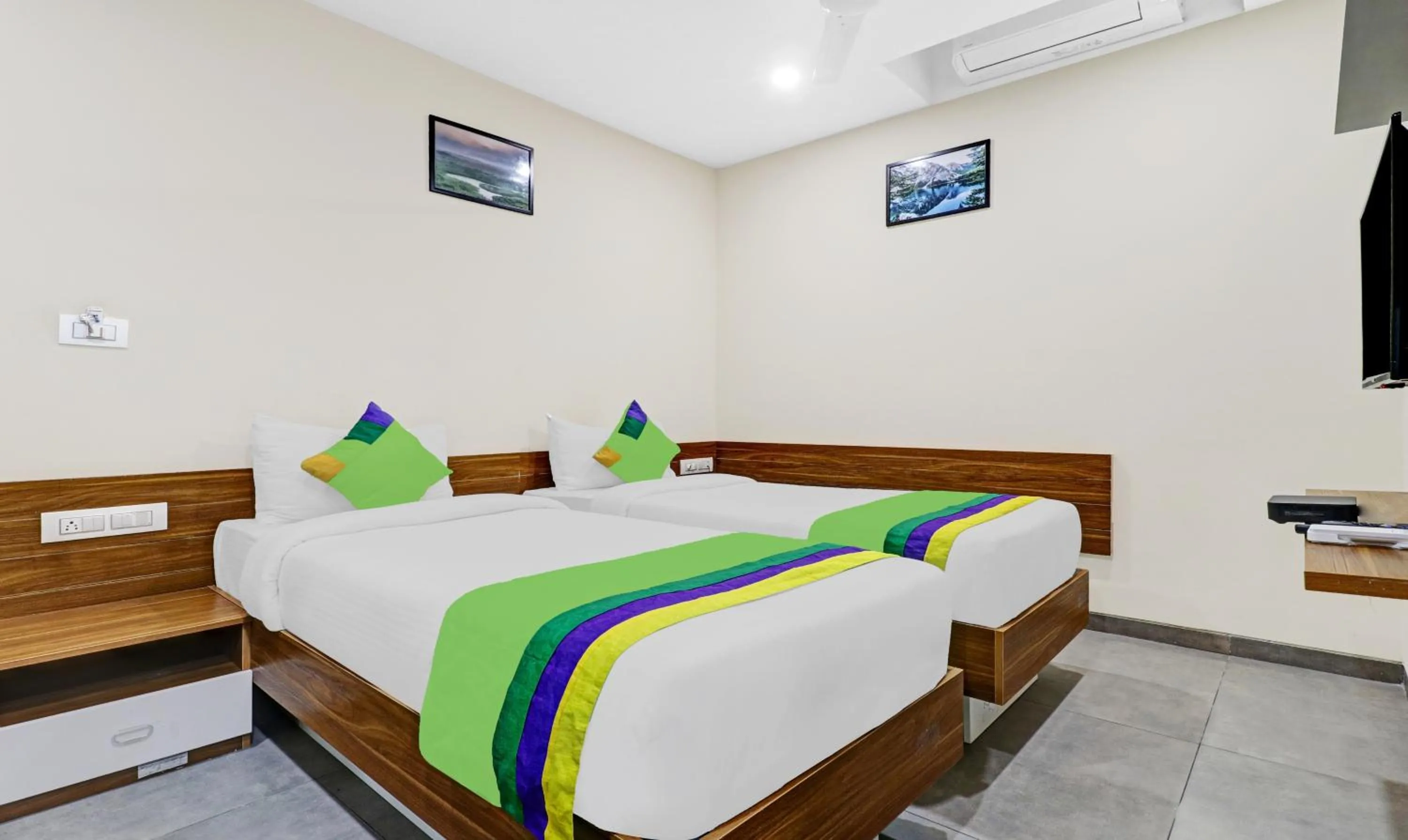 Bedroom, Bed in Treebo Purple Orchid Boutique