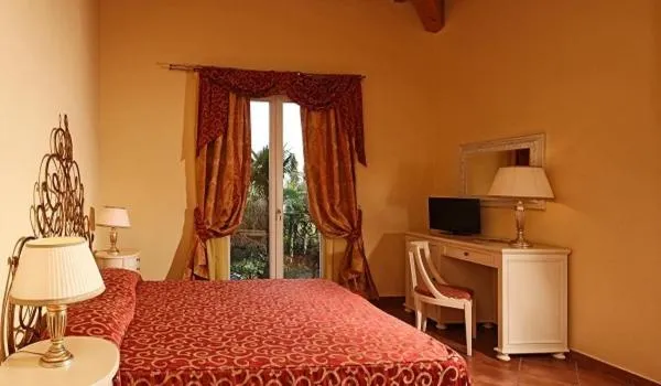 Bed in Villa Sofia Hotel