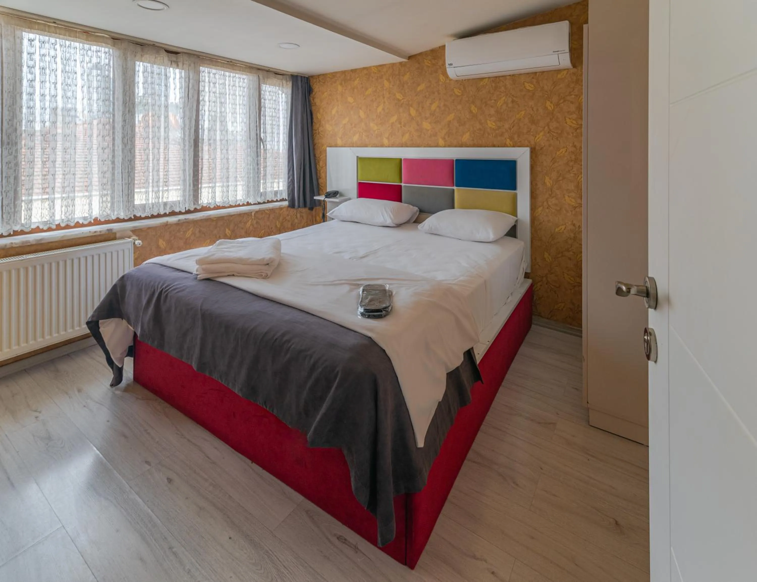 Bed in İmza Hotel Suite