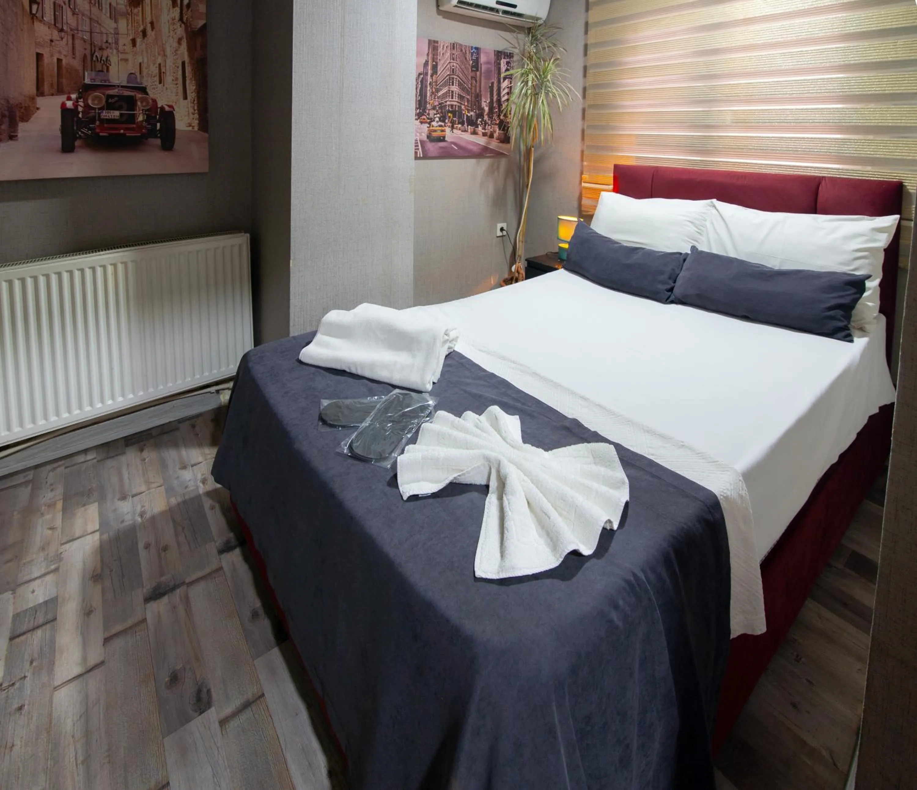 Bed in İmza Hotel Suite